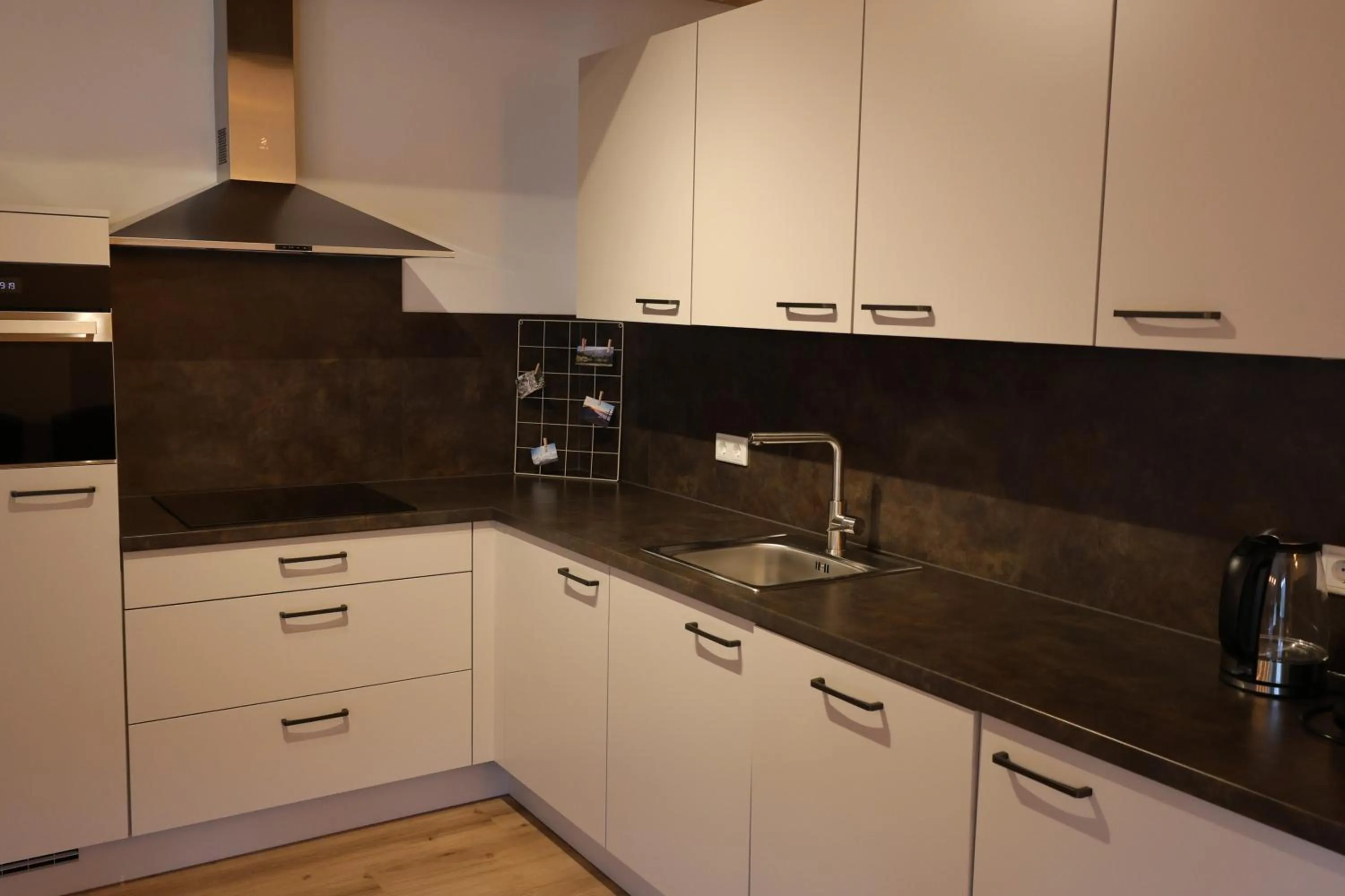 Kitchen or kitchenette in Alpen Experience Apart Hotel