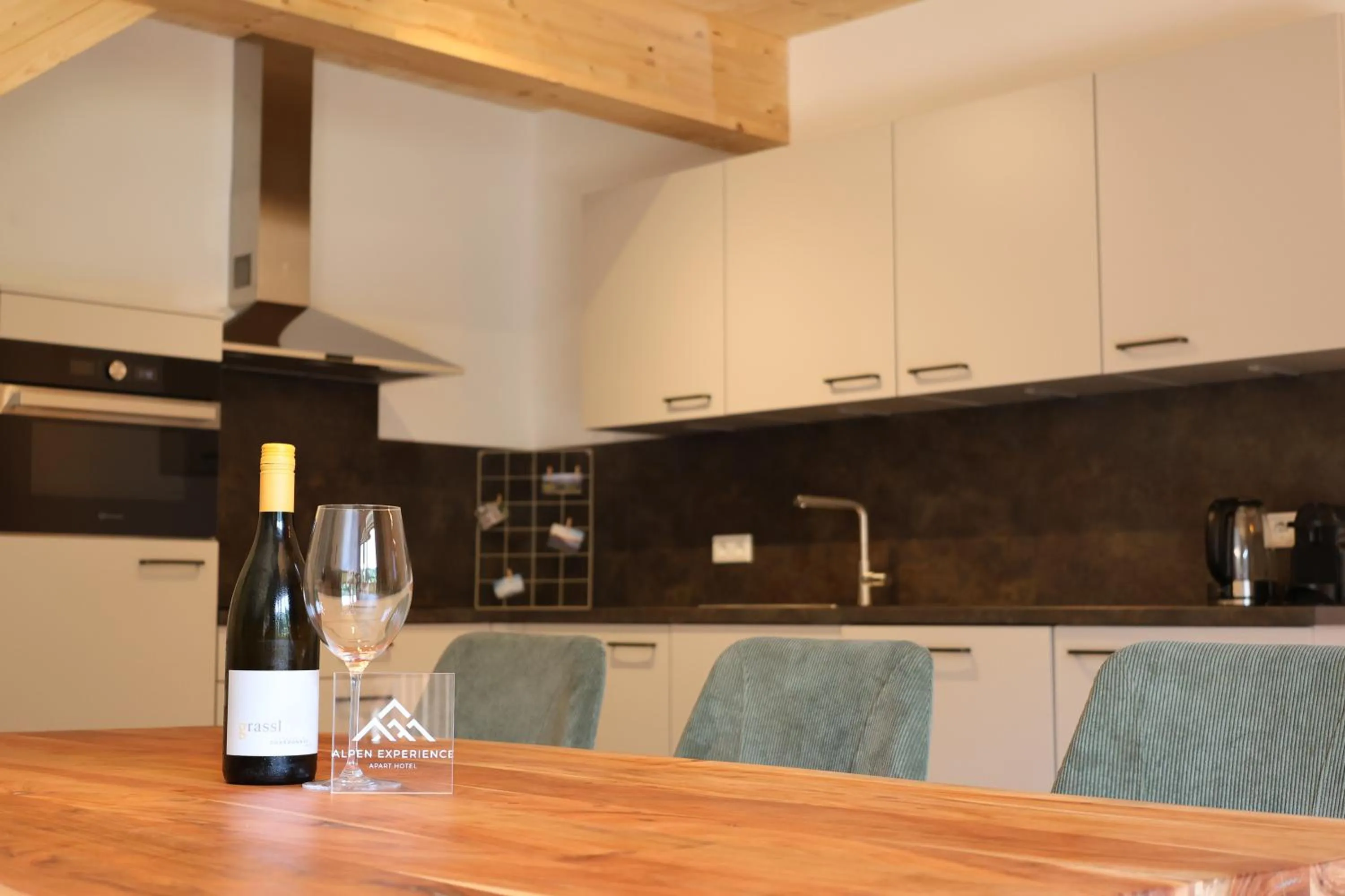 Kitchen or kitchenette in Alpen Experience Apart Hotel