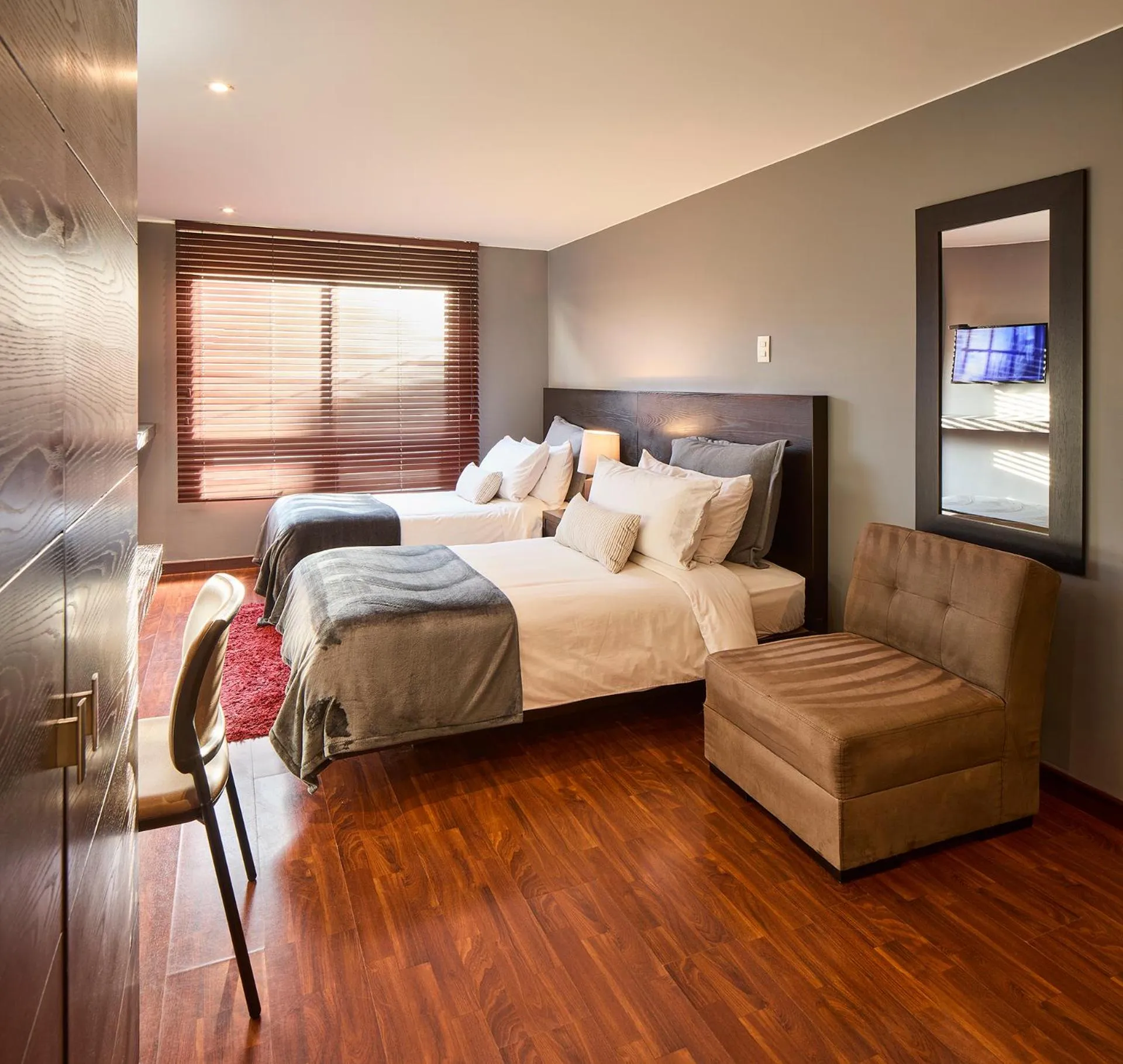 Photo of the whole room, Bed in Nico Apartasuites