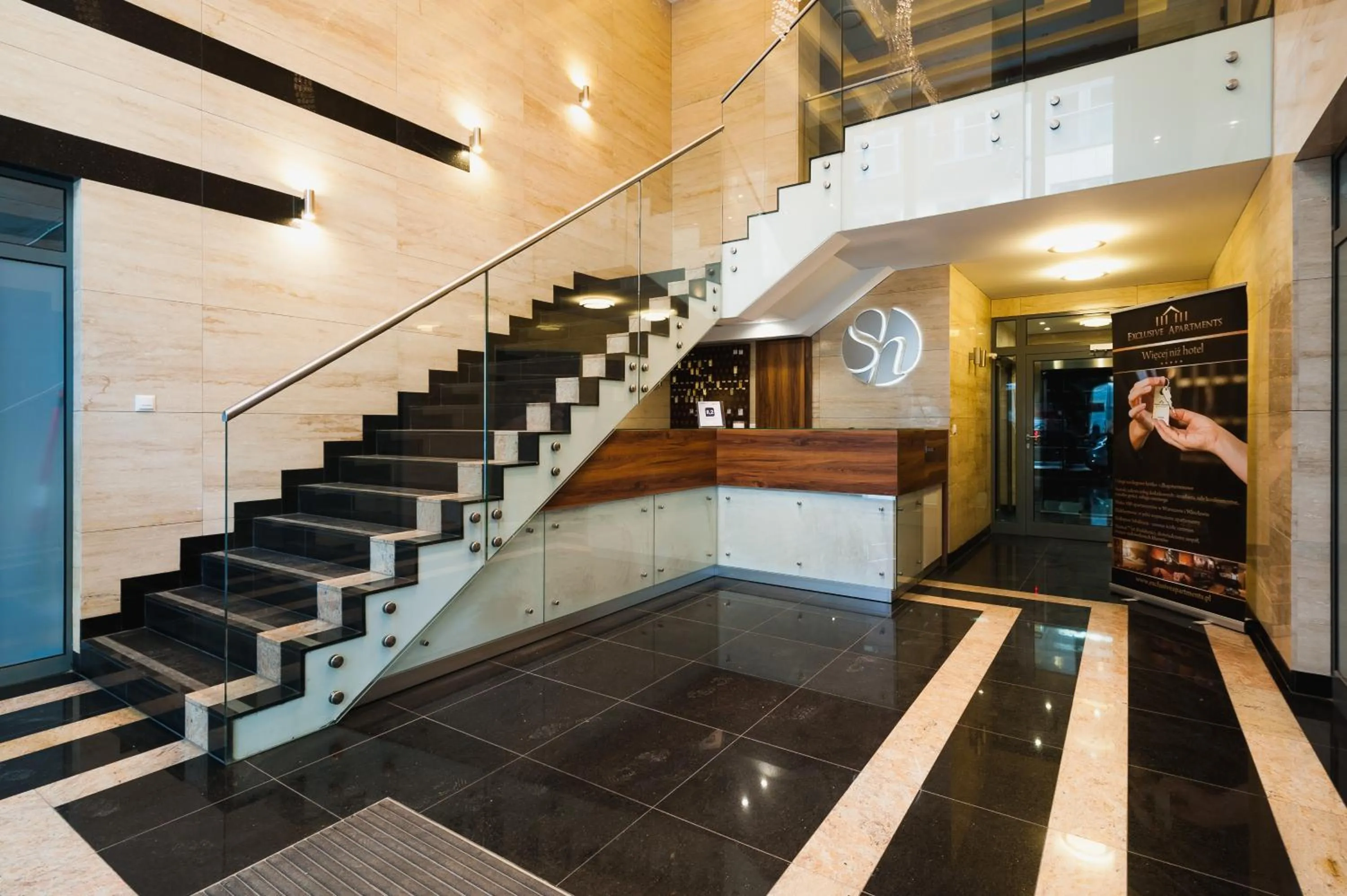 Lobby or reception in EXCLUSIVE Aparthotel