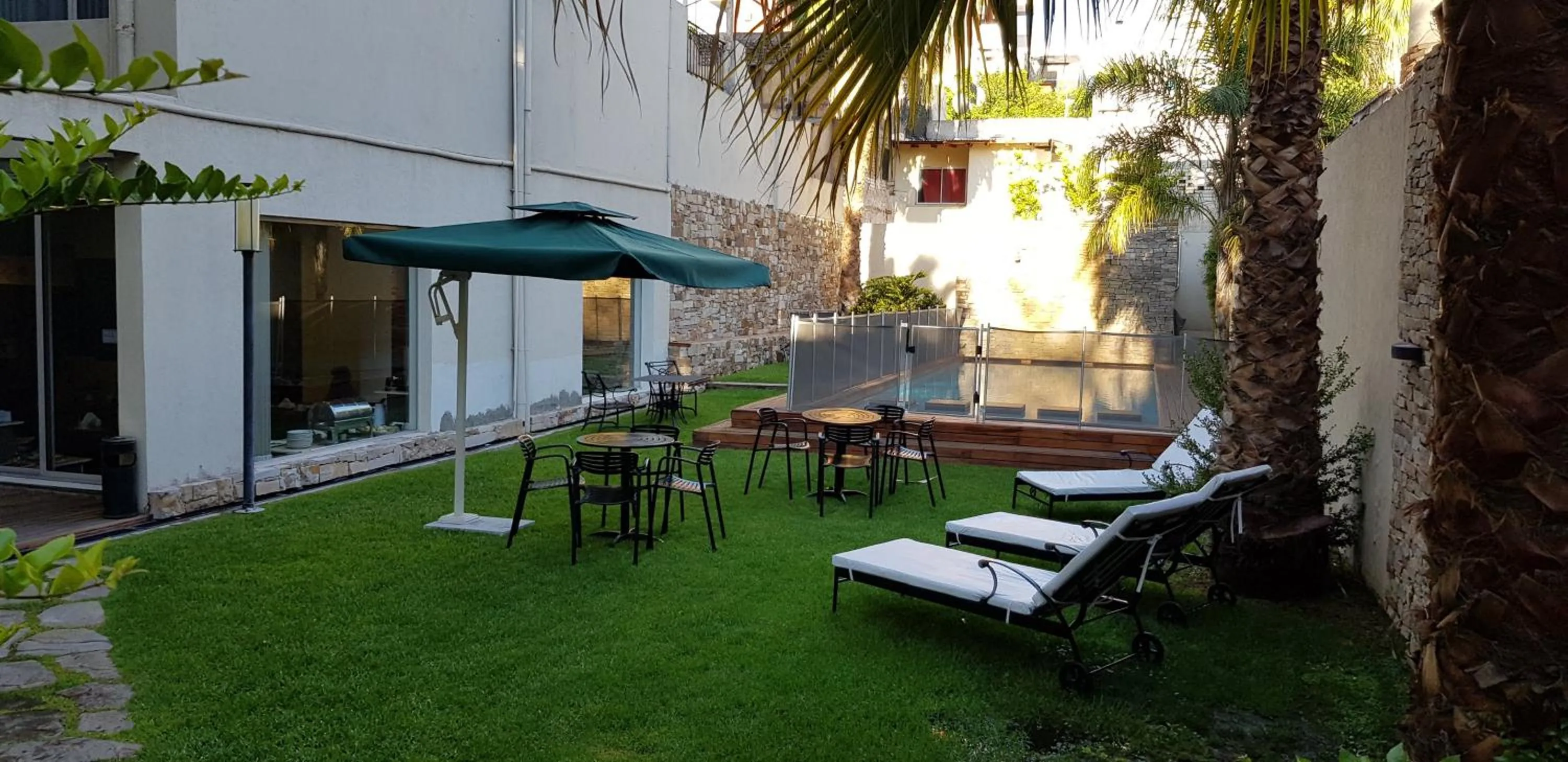 Swimming pool in Villaggio Hotel Boutique