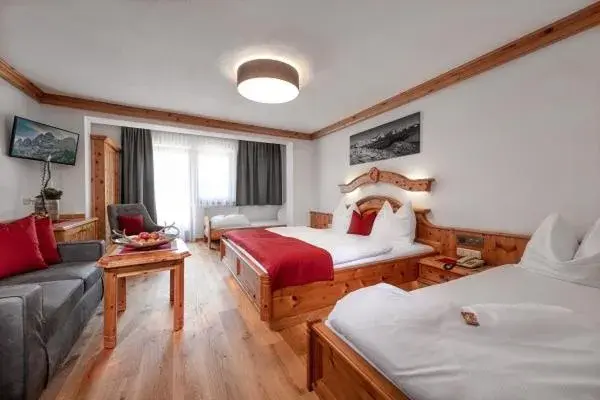 Quadruple Room with Balcony in Hotel Hubertushof Quadruple Room with Balcony in Hotel Hubertushof