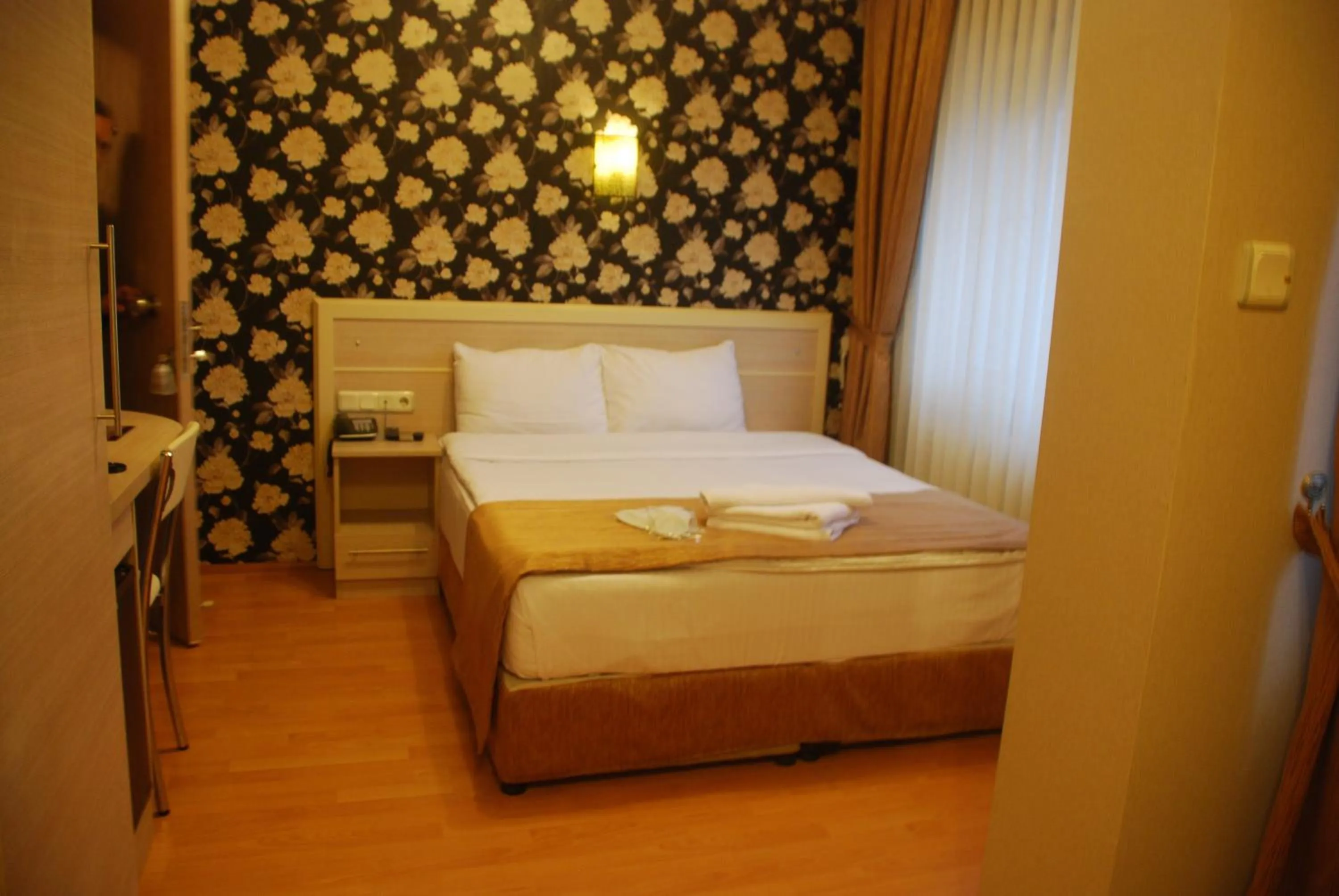 Decorative detail, Bed in Mini Hotel