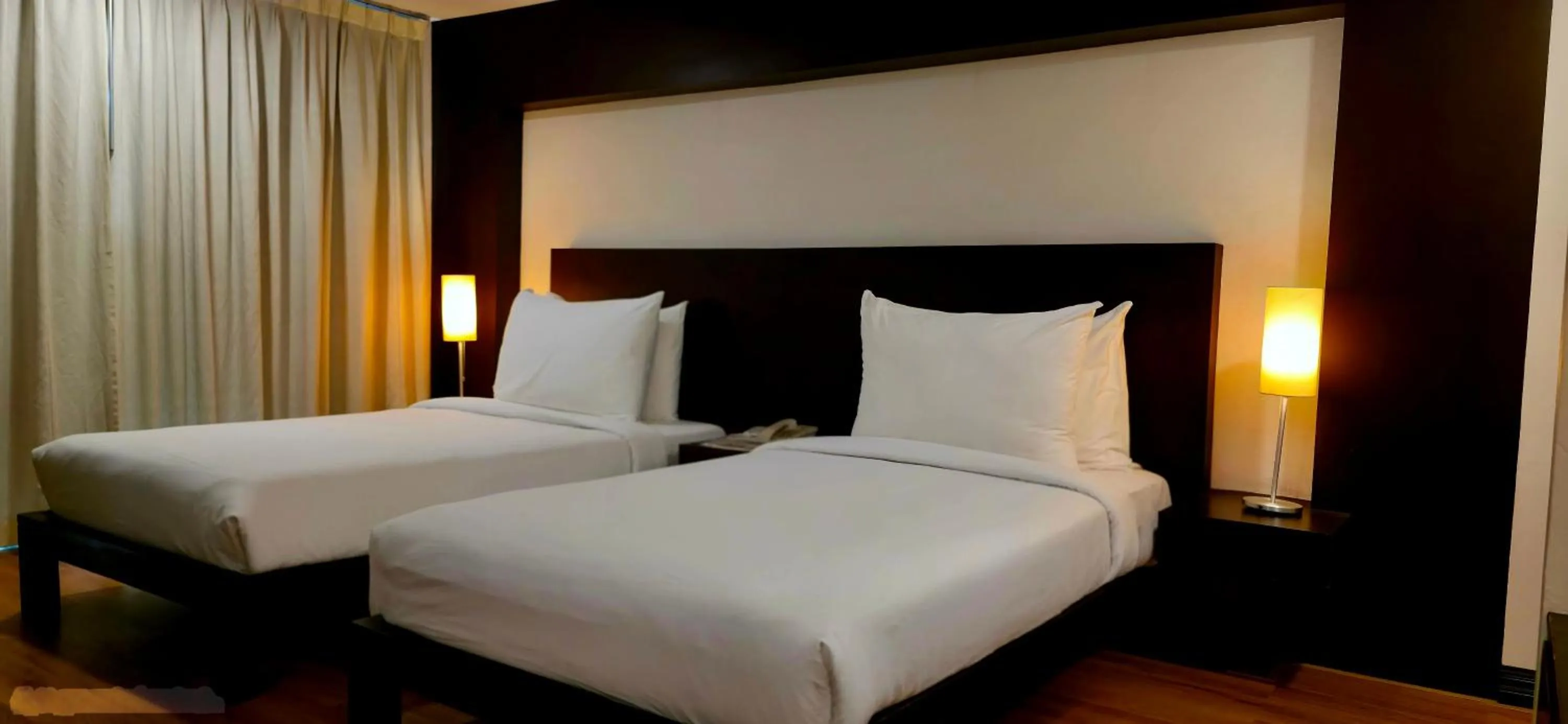 Bed in City Inn Vientiane