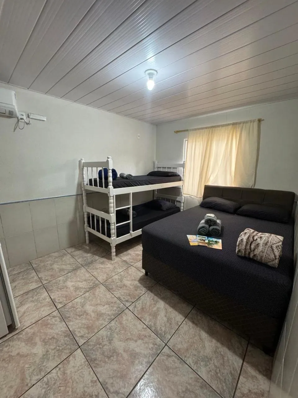 Bed in Pousada Tio Tonho