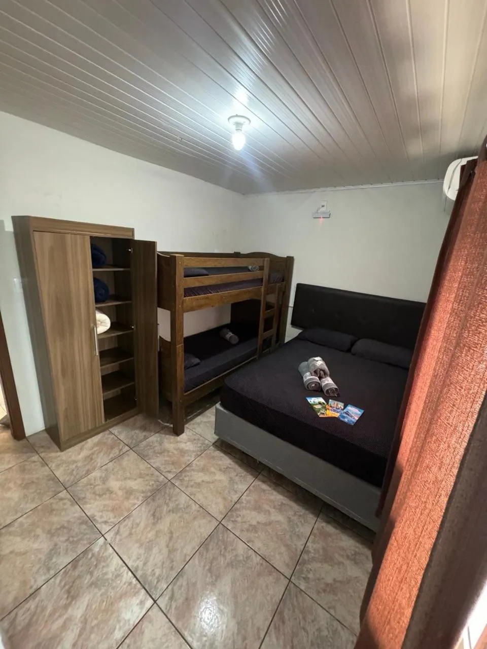 Bed in Pousada Tio Tonho