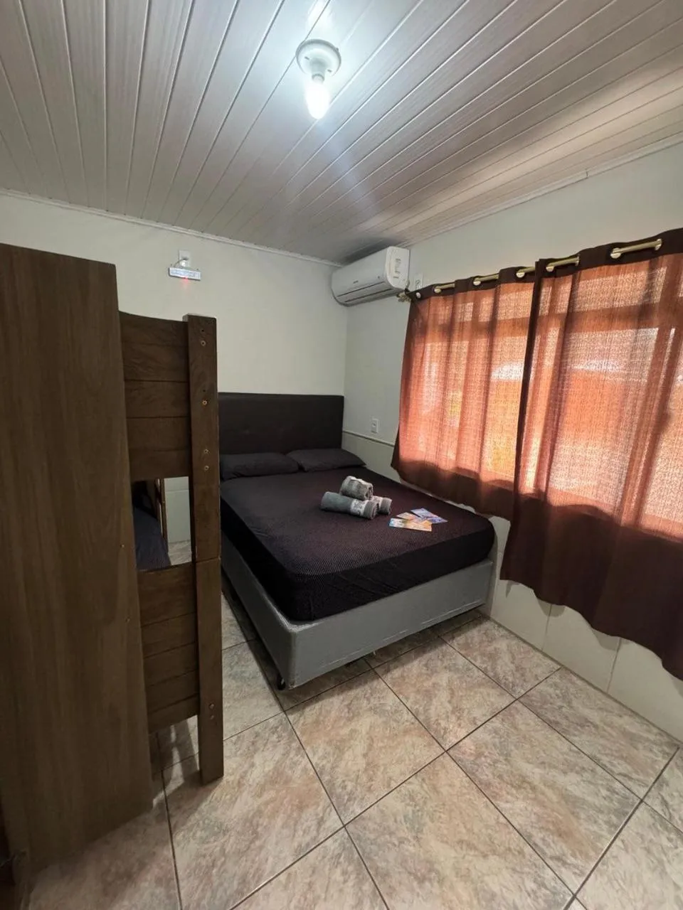 Bed in Pousada Tio Tonho