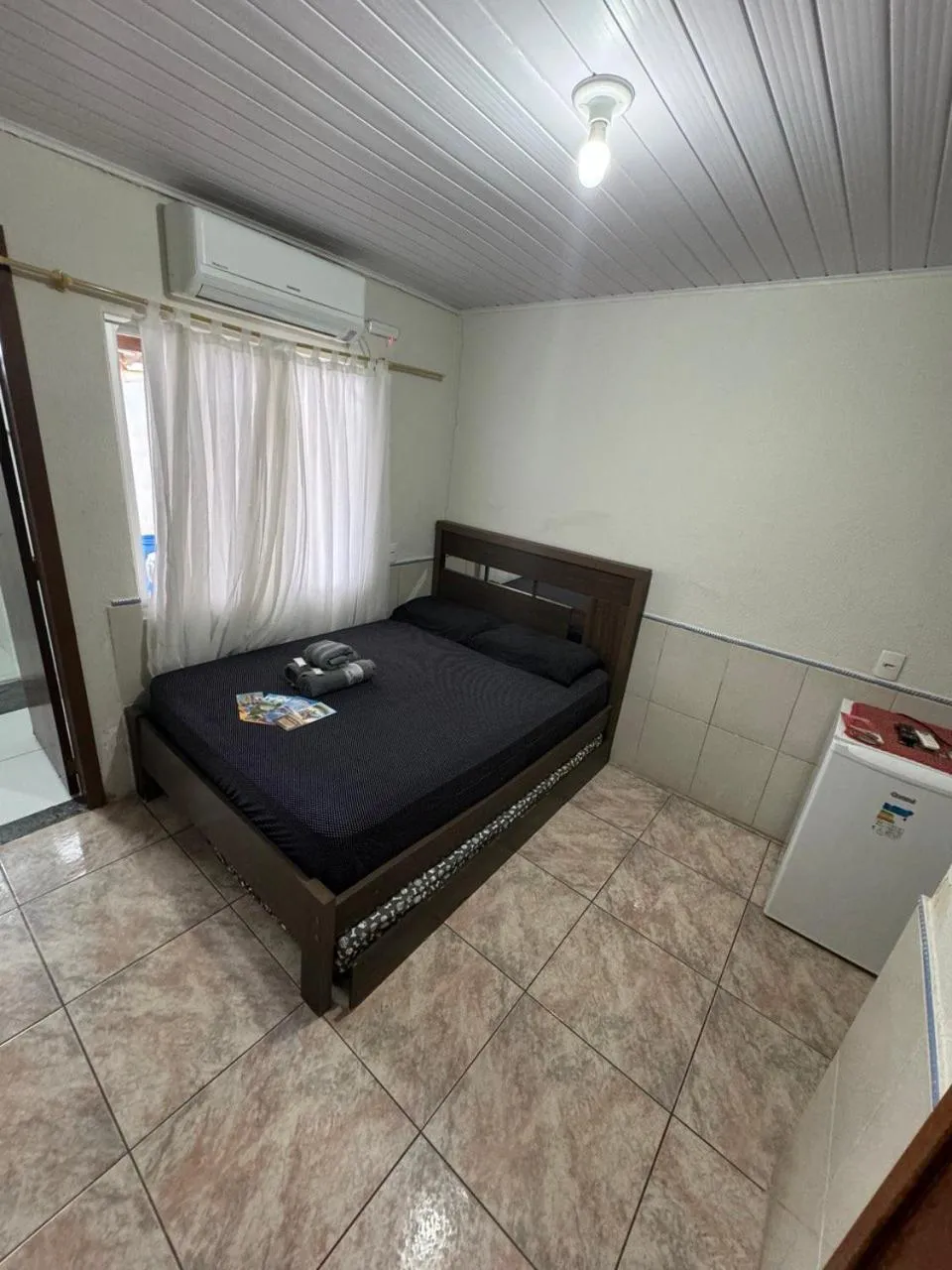 Bed in Pousada Tio Tonho