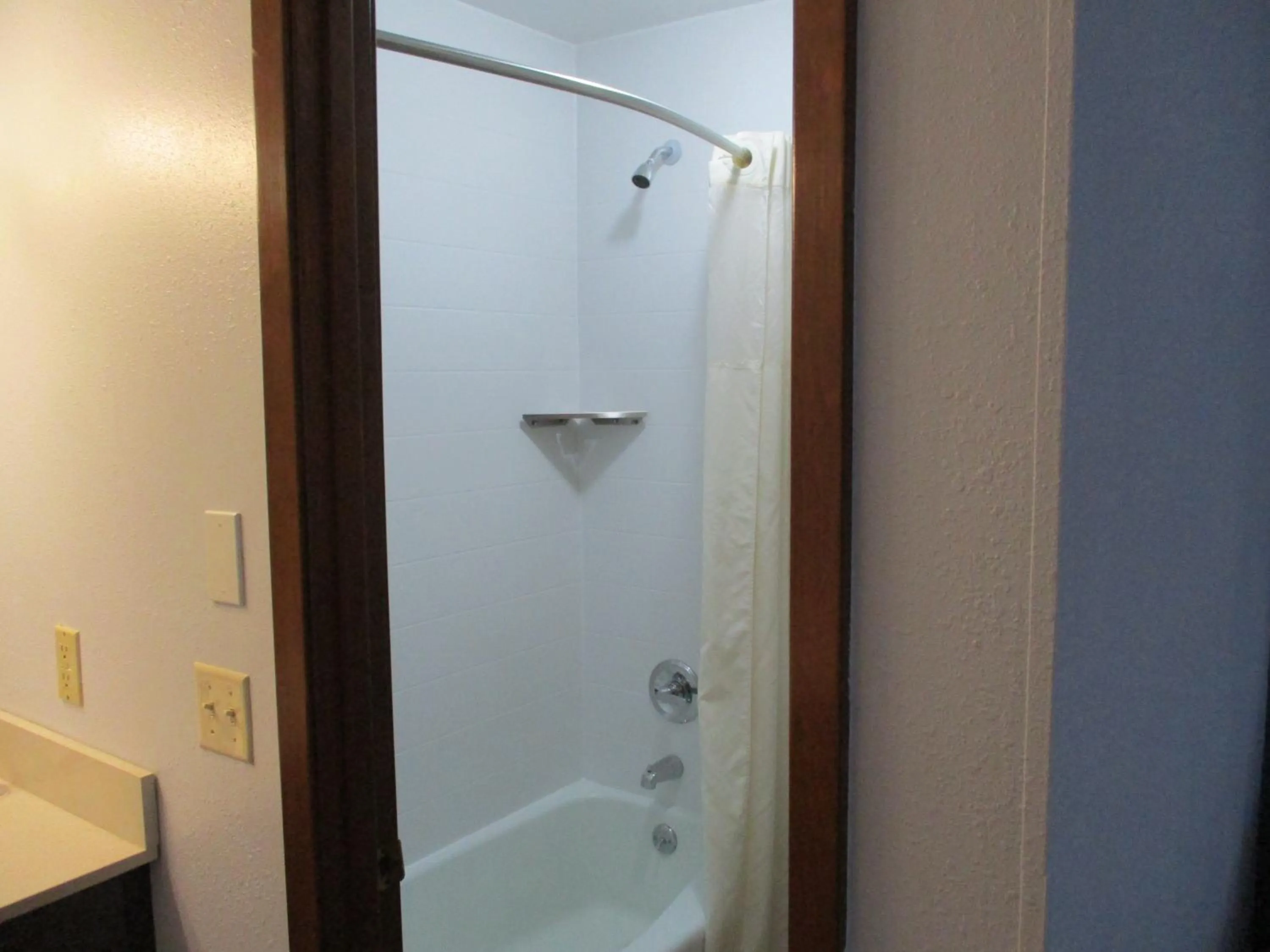 Bathroom in Travelodge by Wyndham Spirit Lake/Okoboji