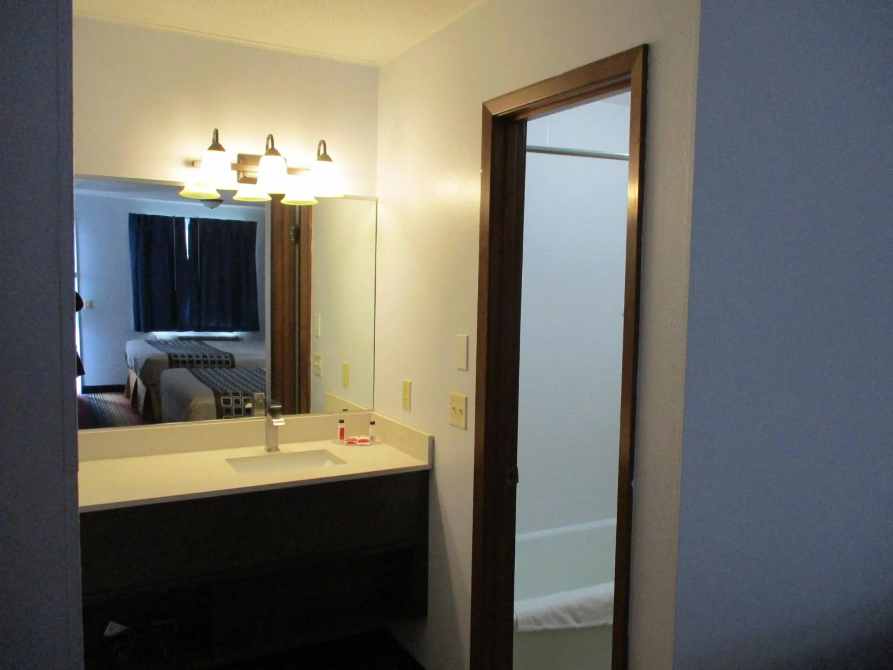 Bathroom in Travelodge by Wyndham Spirit Lake/Okoboji