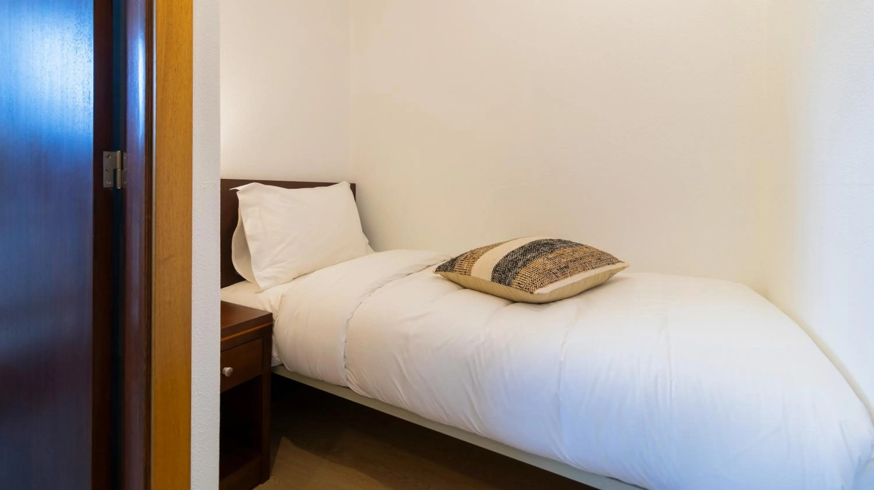 Bed in Albergaria Quim Barreiros