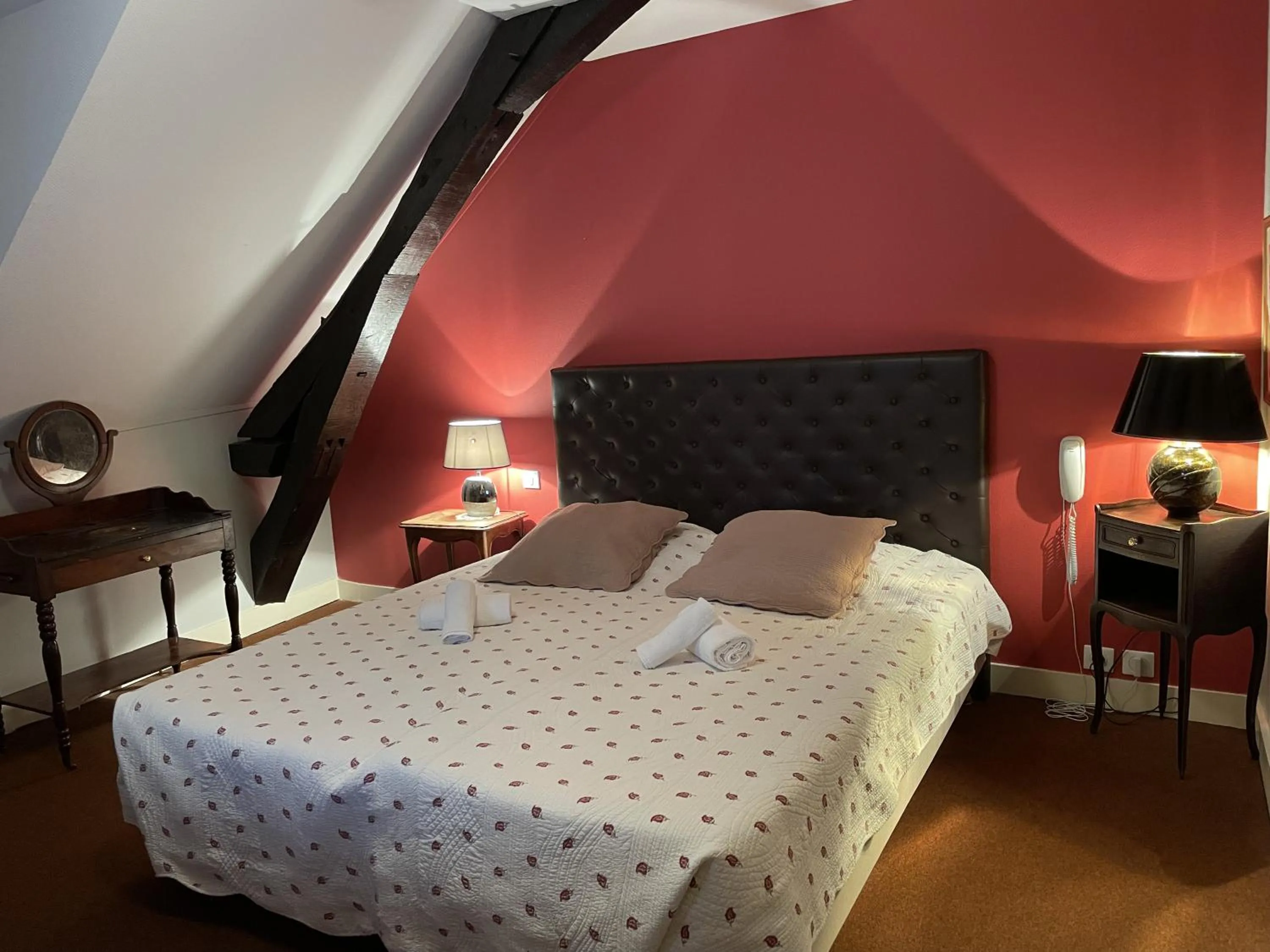 Bedroom in Logis Hôtel Teyssier
