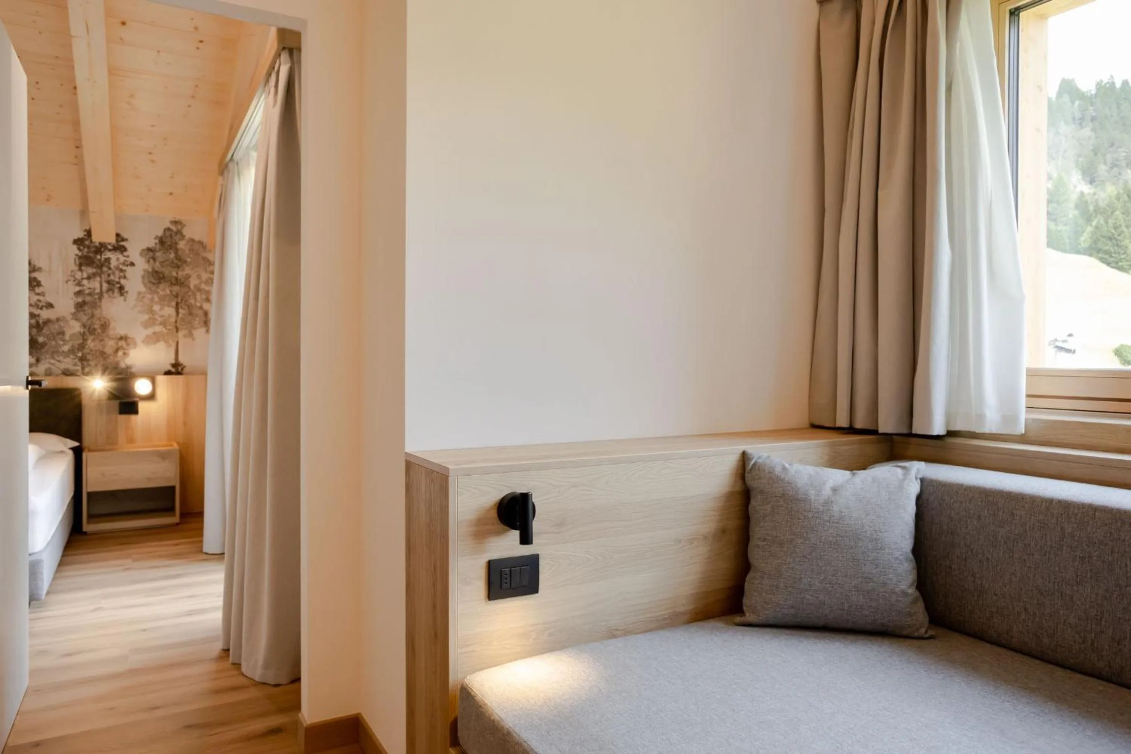 Living room, Bed in Wellness Hotel Dolomia