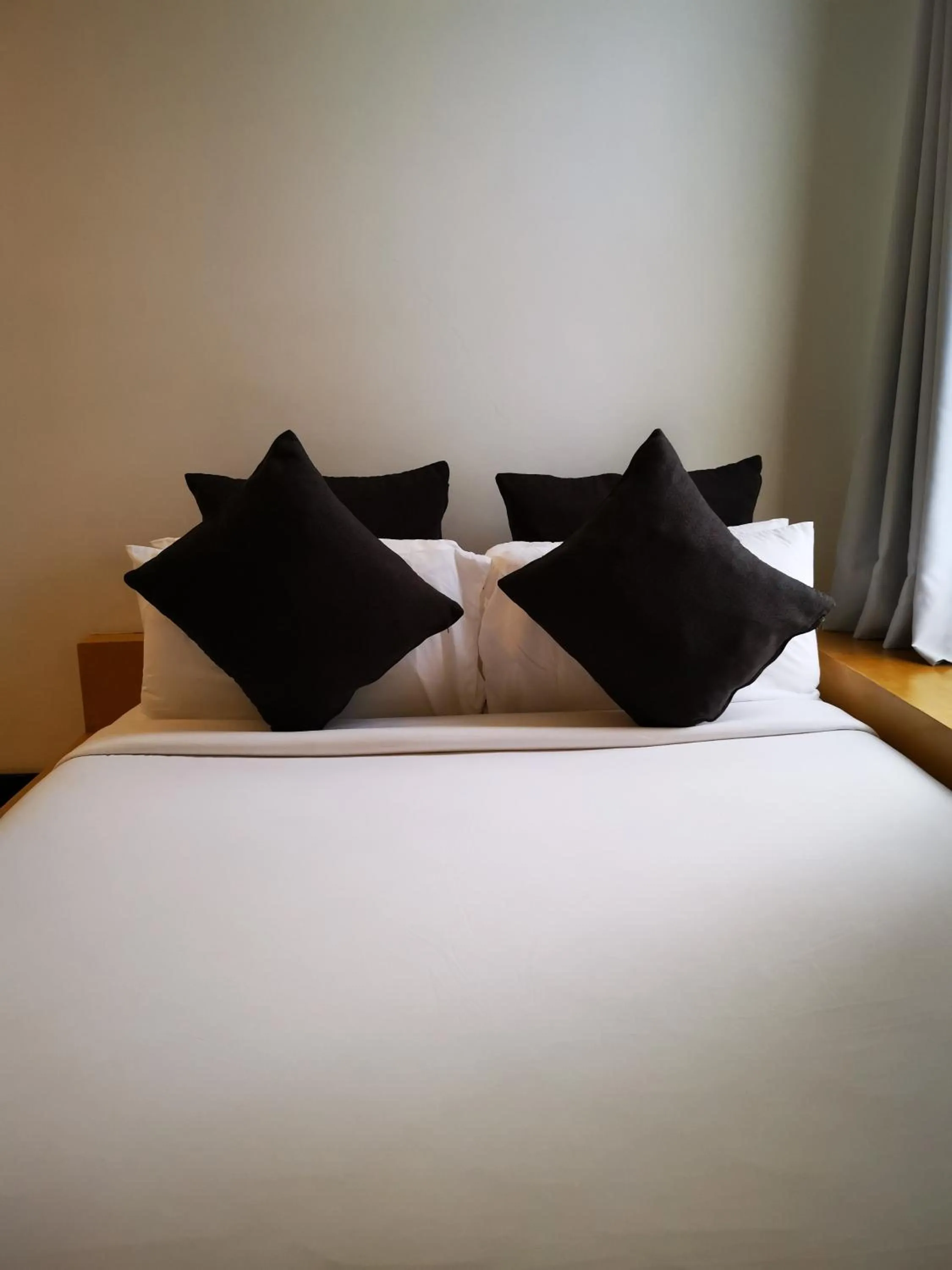 Bed in Urban Boutique Hotel