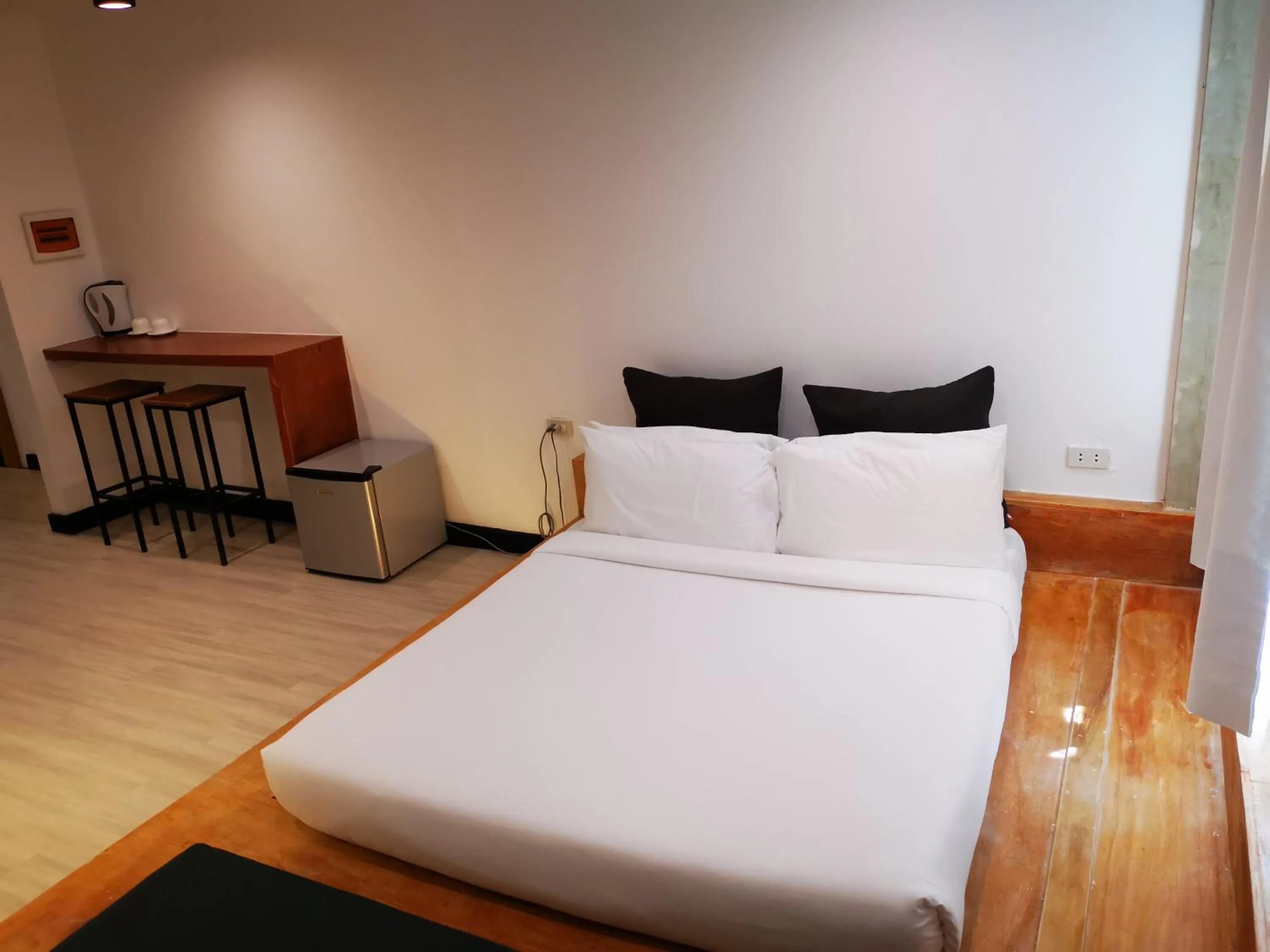 Bed in Urban Boutique Hotel