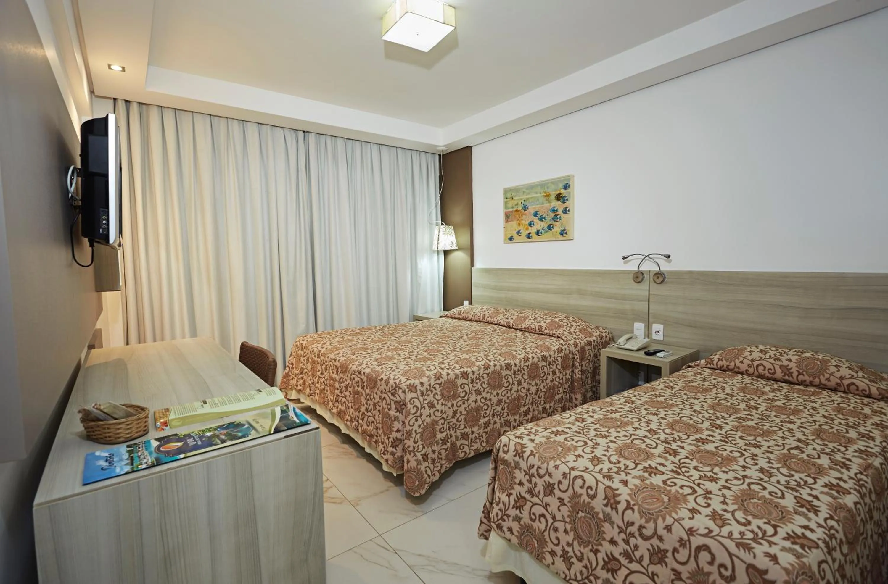 Bed in Visual Praia Hotel