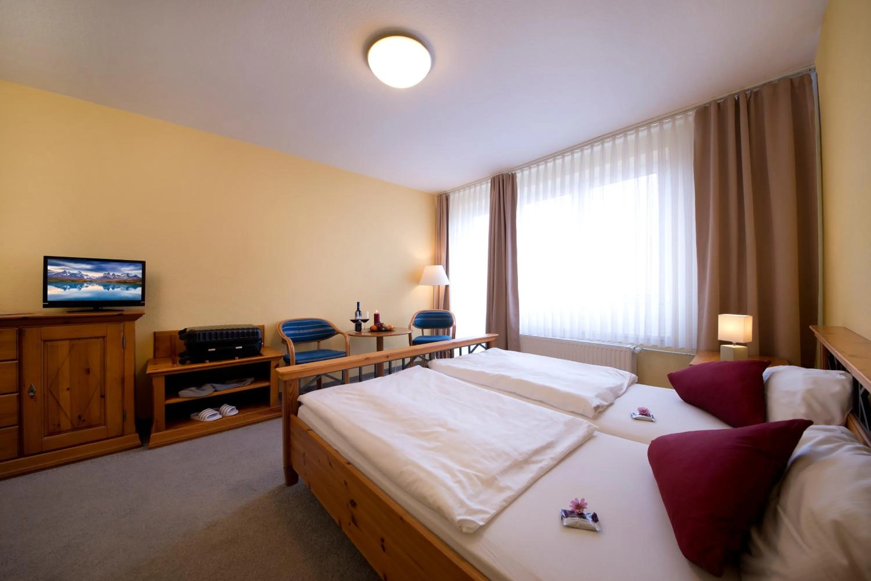 Photo of the whole room, Bed in Aktivhotel Heikenberg in Bad Lauterberg
