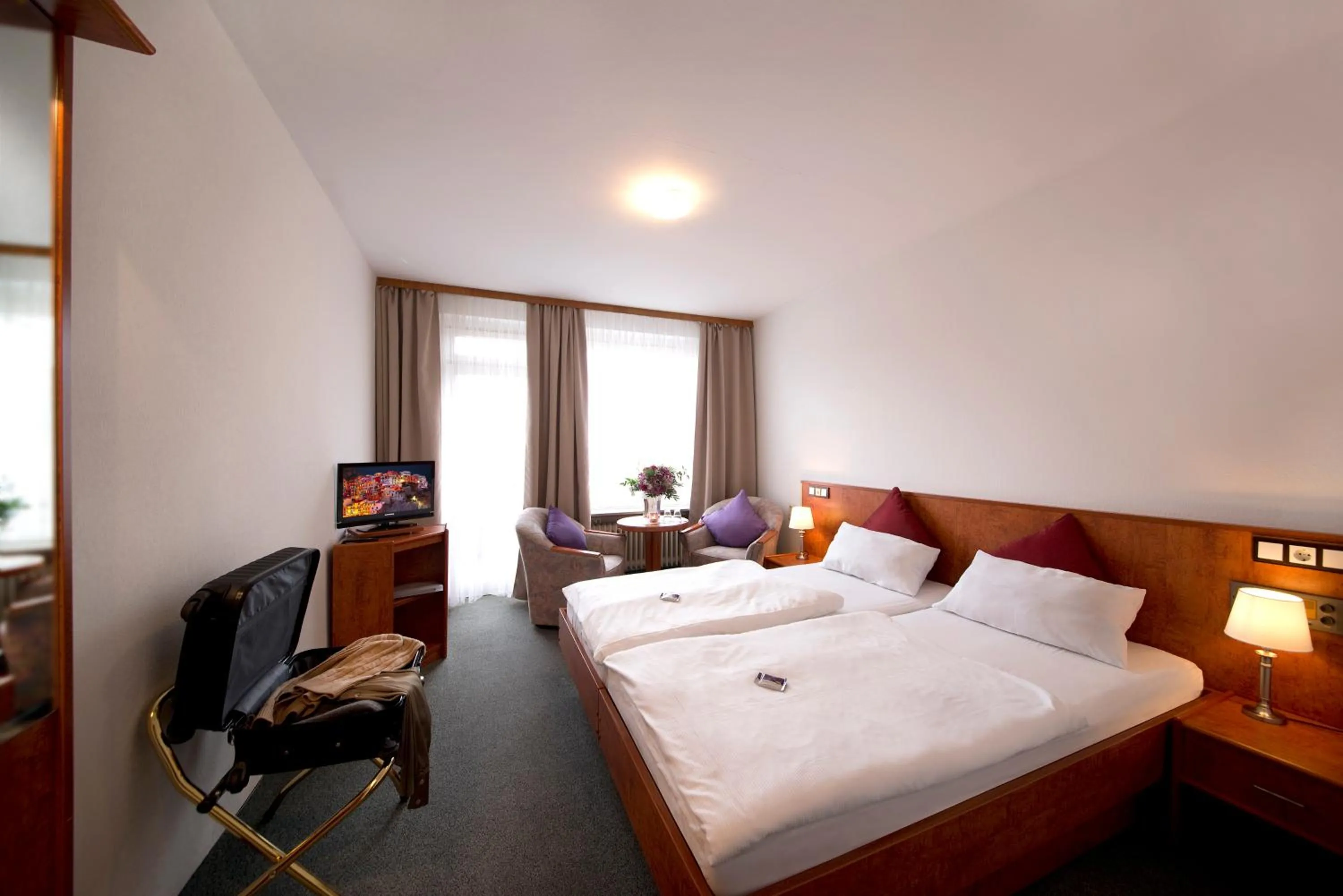 Photo of the whole room, Bed in Aktivhotel Heikenberg in Bad Lauterberg