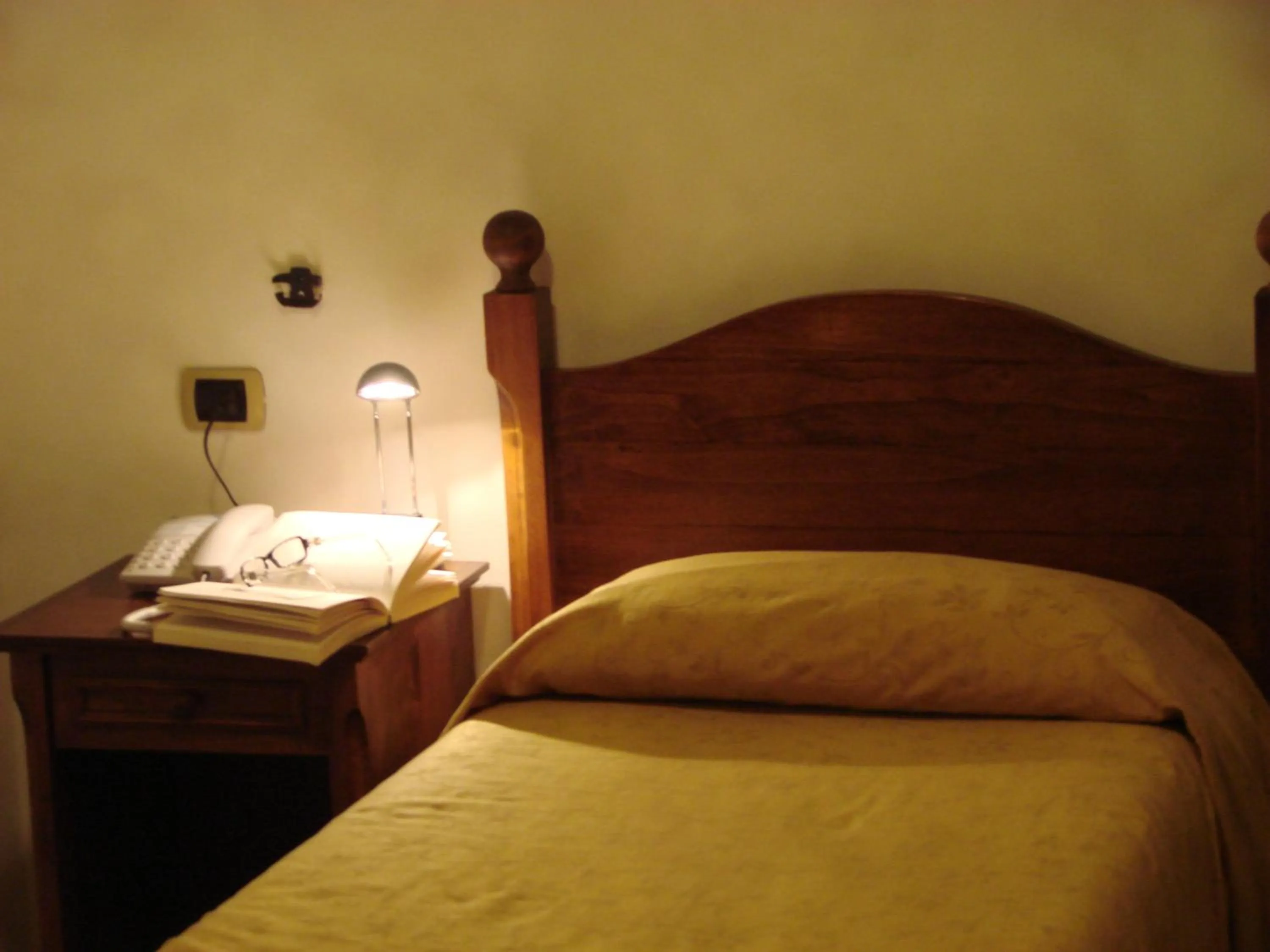 Bed in Hotel Palazzo Brunamonti