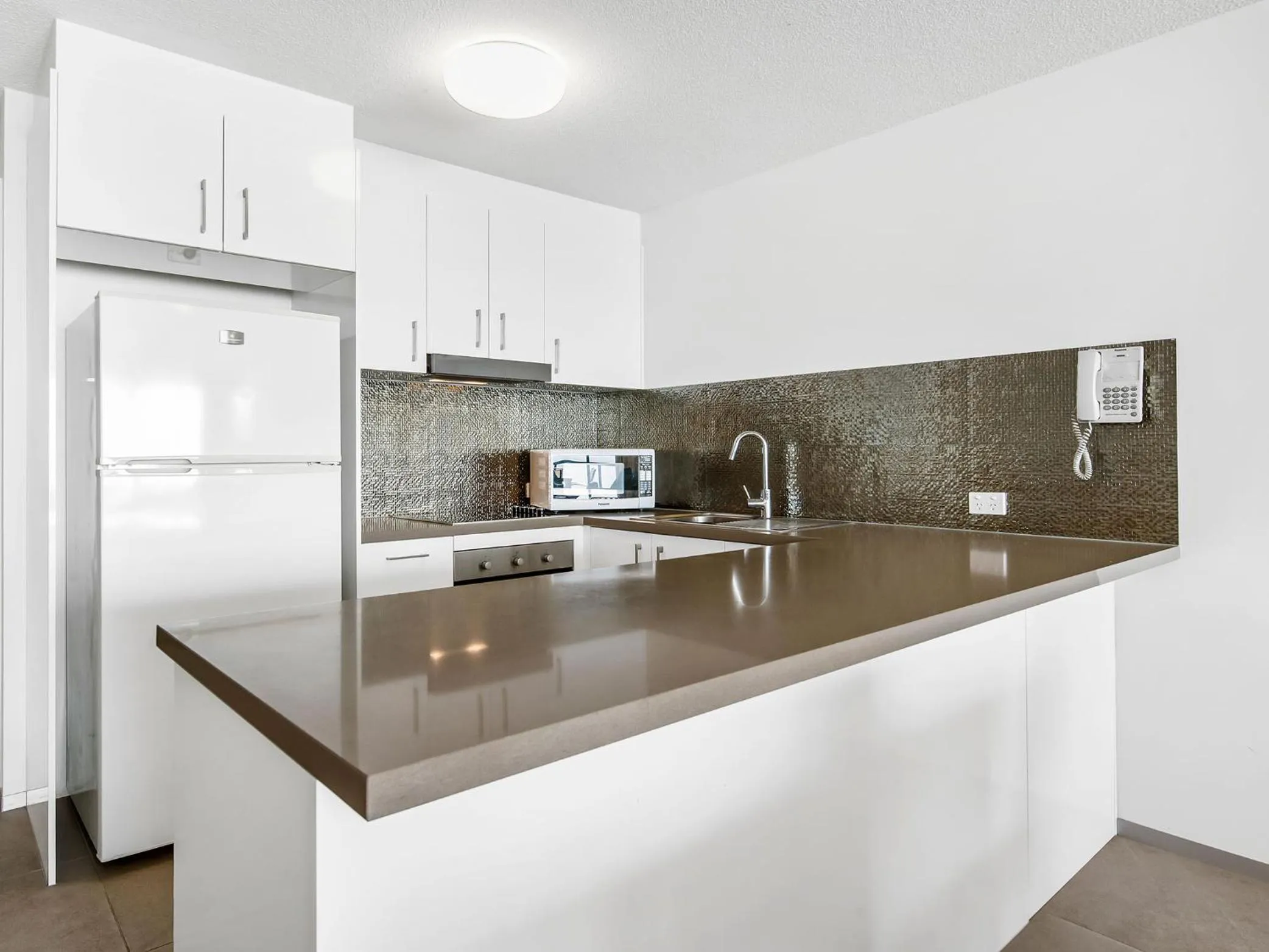 Kitchen or kitchenette in Peninsular Beachfront Resort