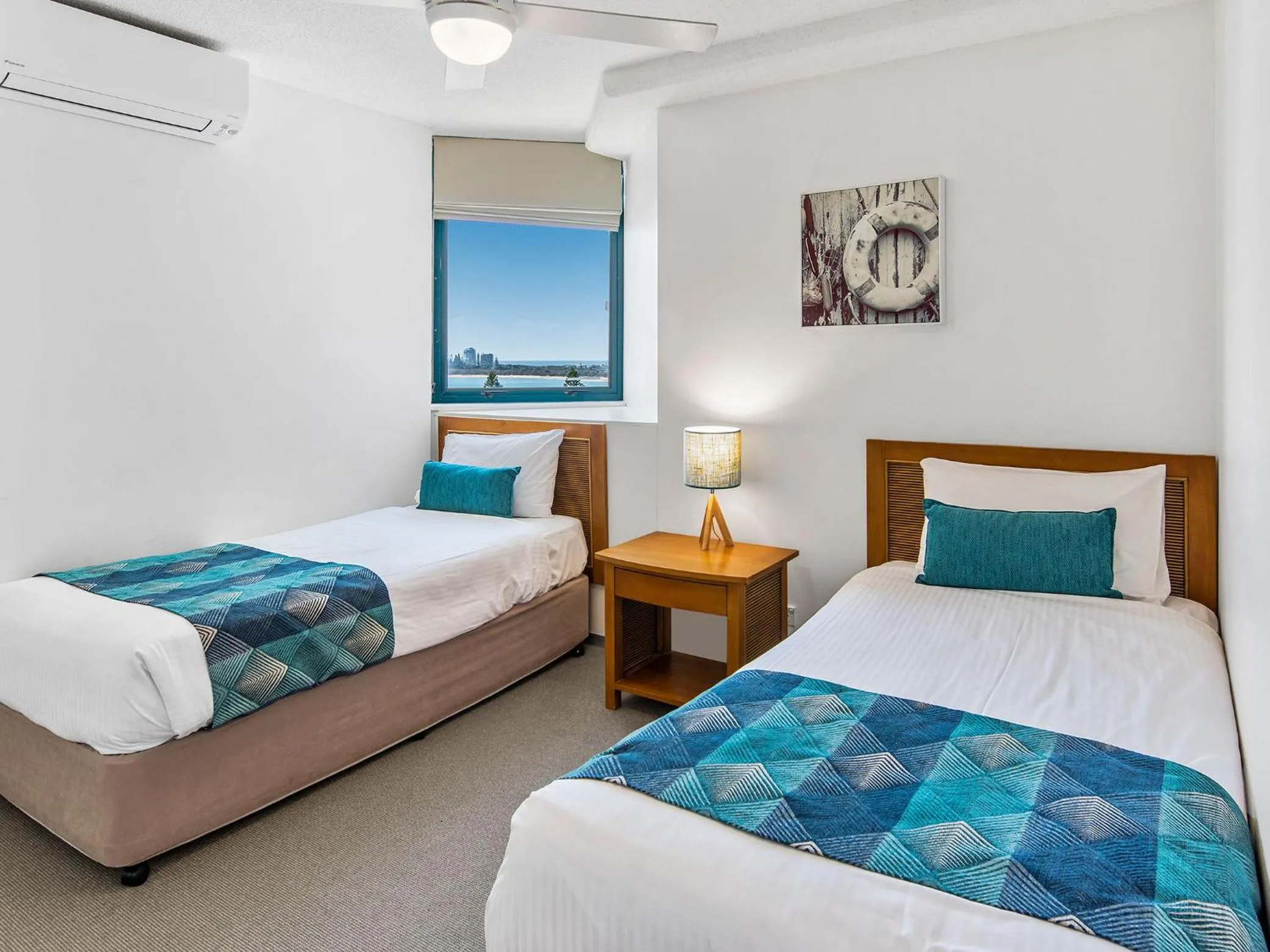 Bed in Peninsular Beachfront Resort