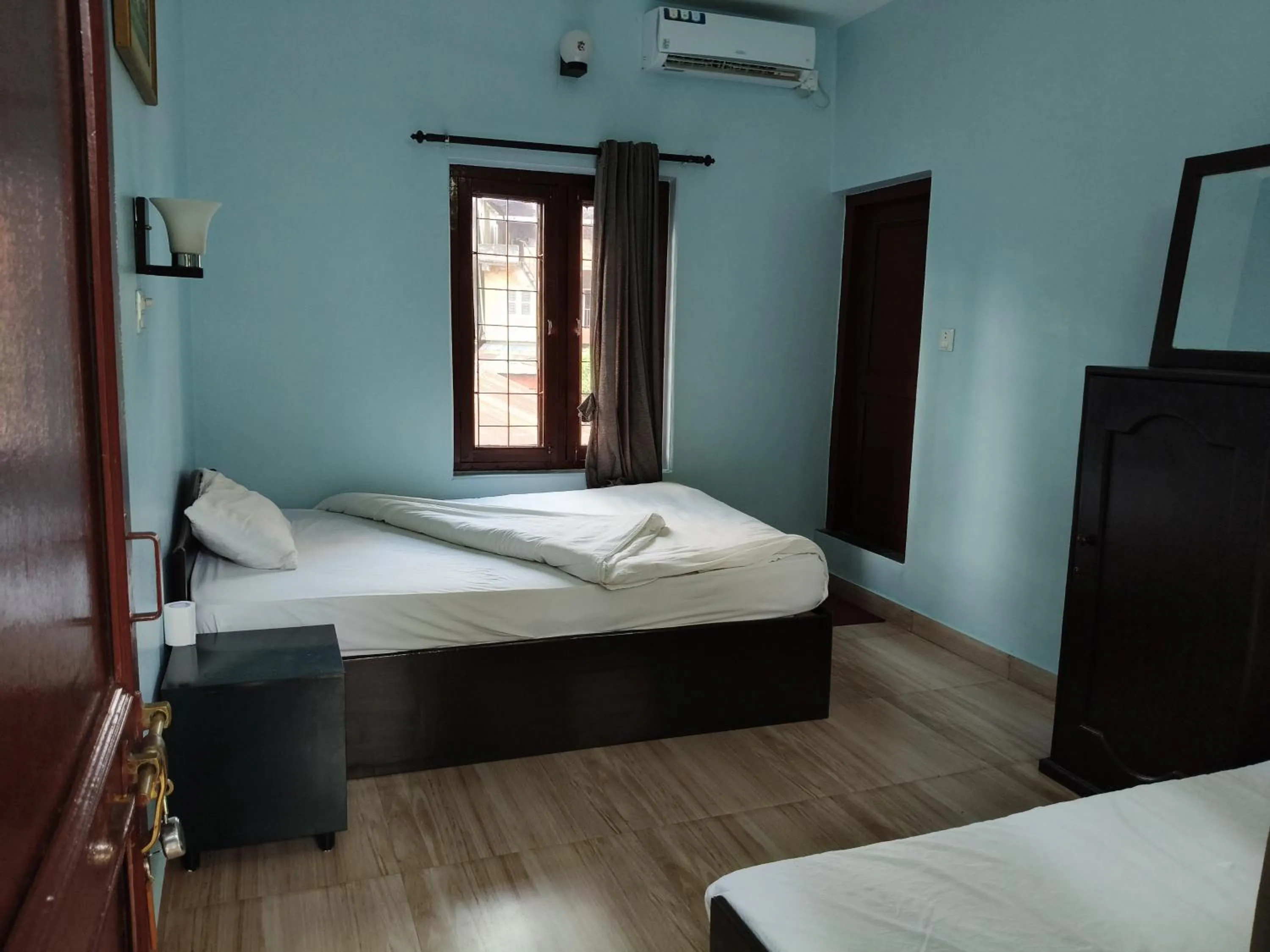 Bed in Yeti Guest House