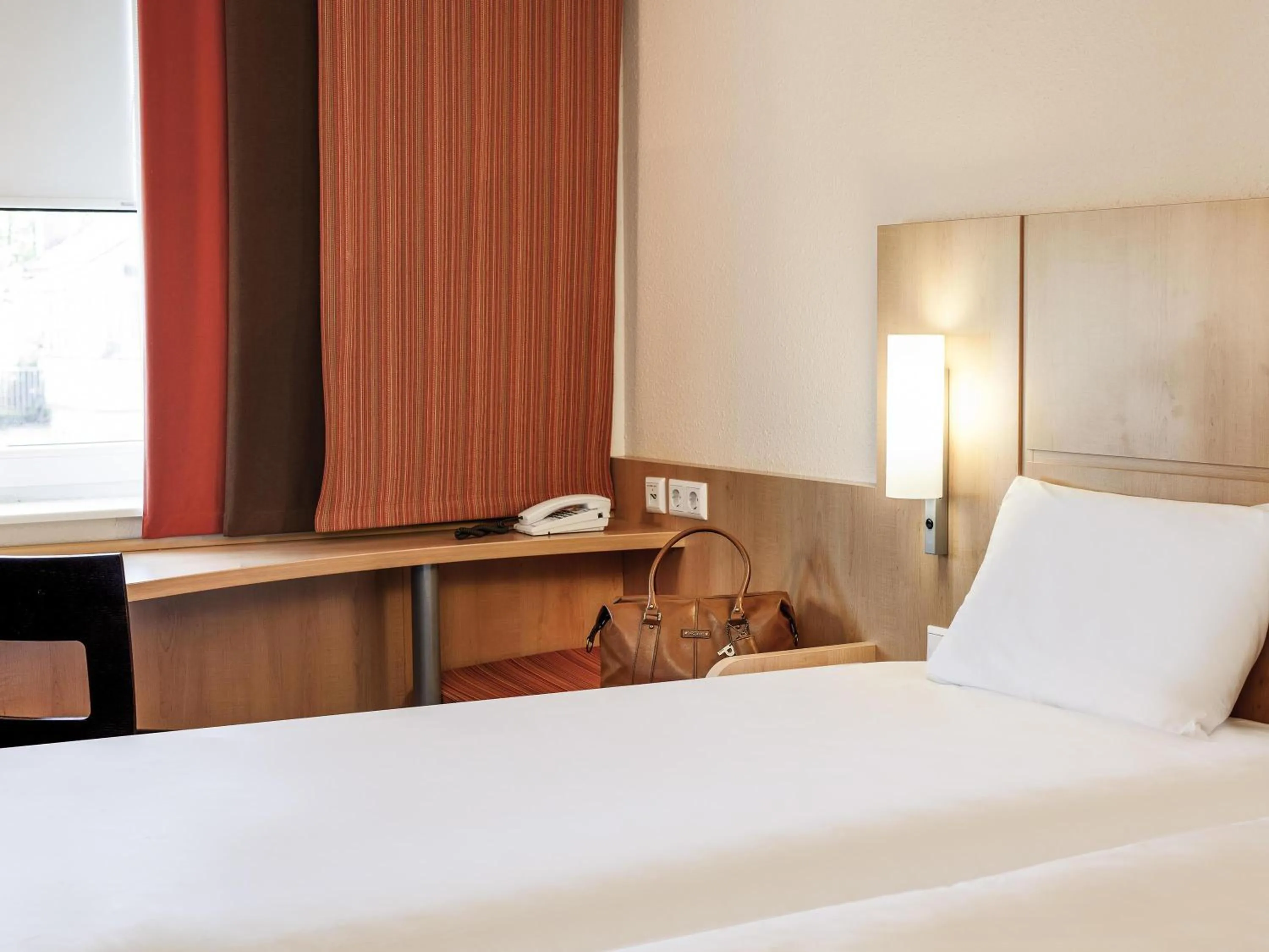 Bedroom, Bed in ibis Konstanz