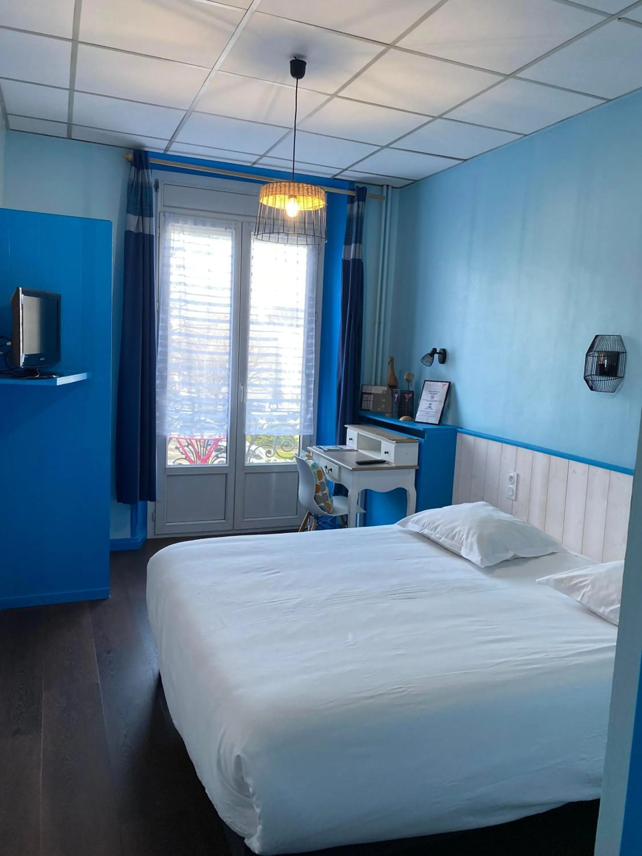 Bed in Hotel Le Colibri