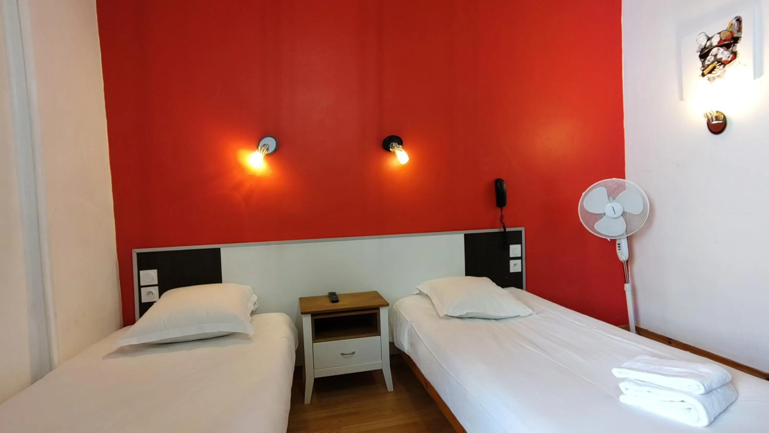 Bed in Hotel Le Colibri