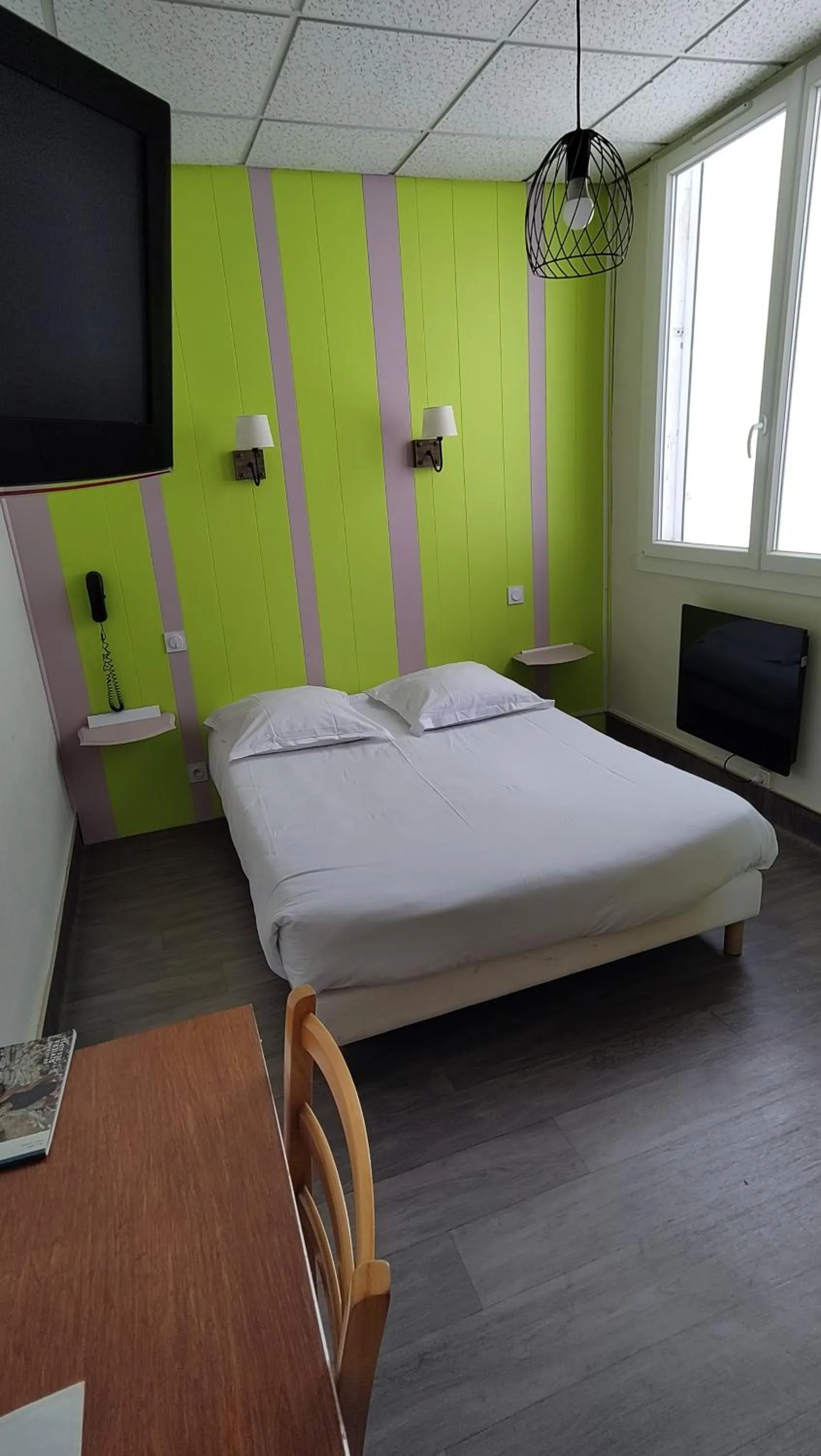 Bed in Hotel Le Colibri