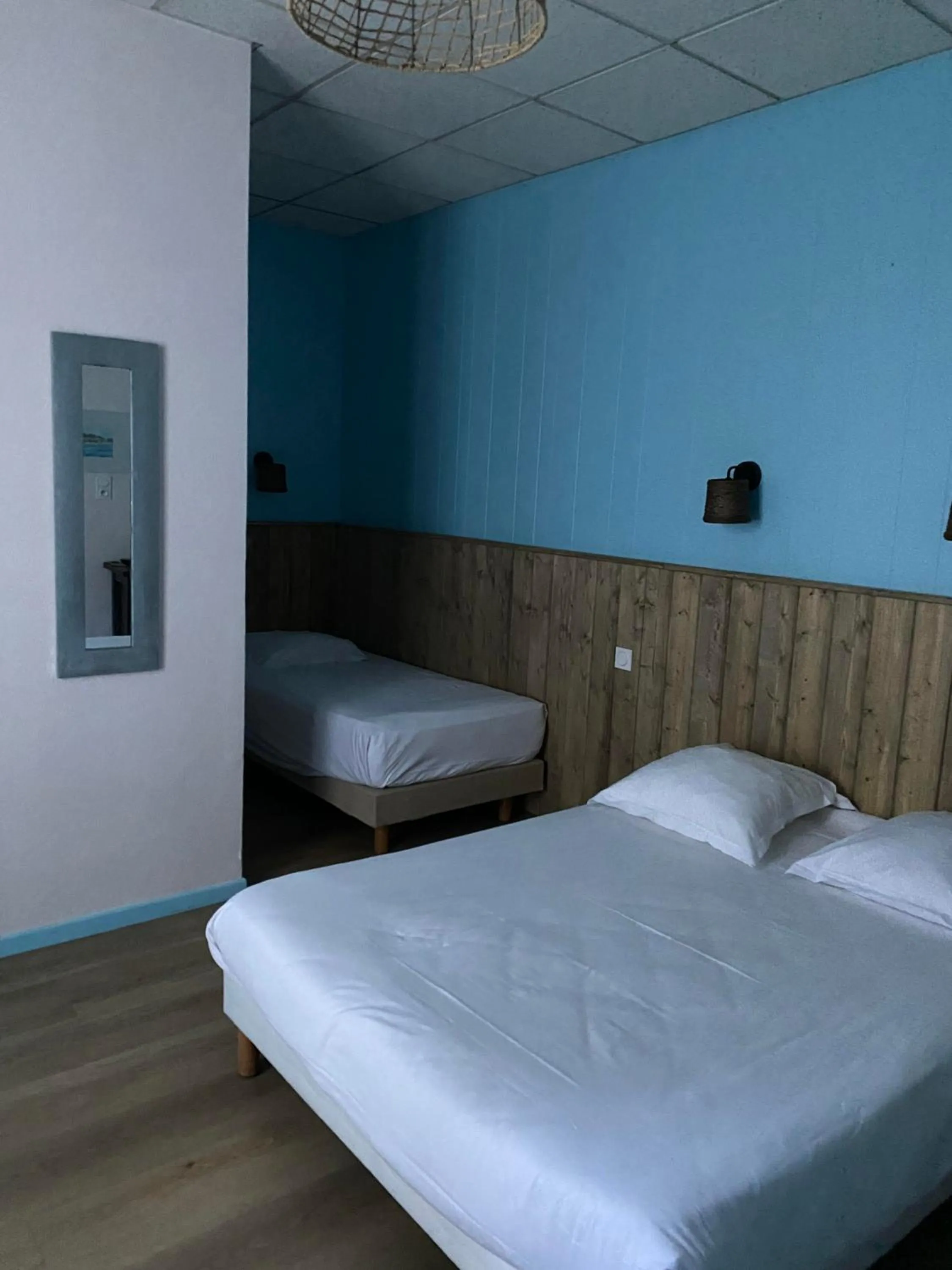 Bed in Hotel Le Colibri