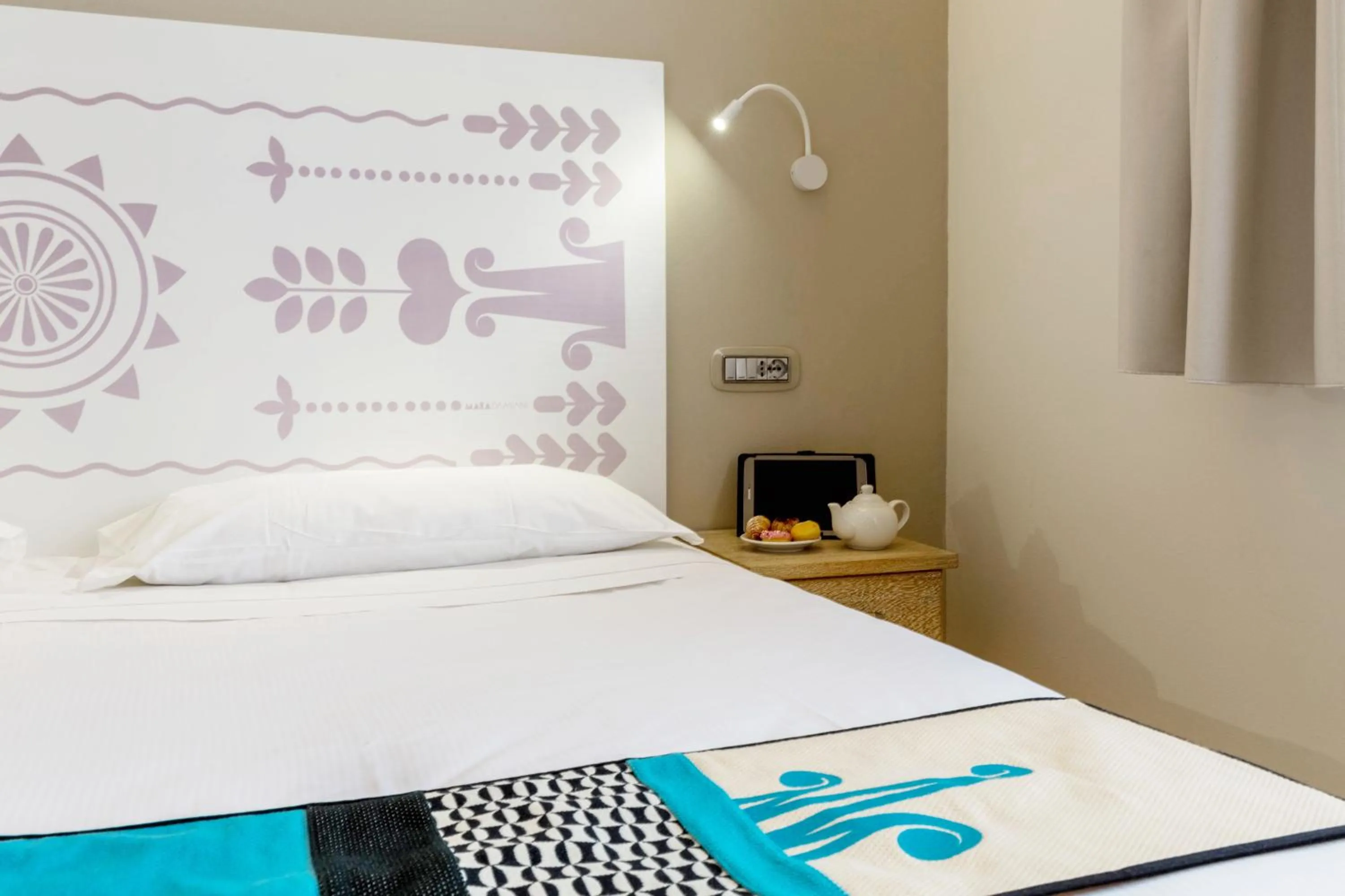 Decorative detail, Bed in Hotel Domomea