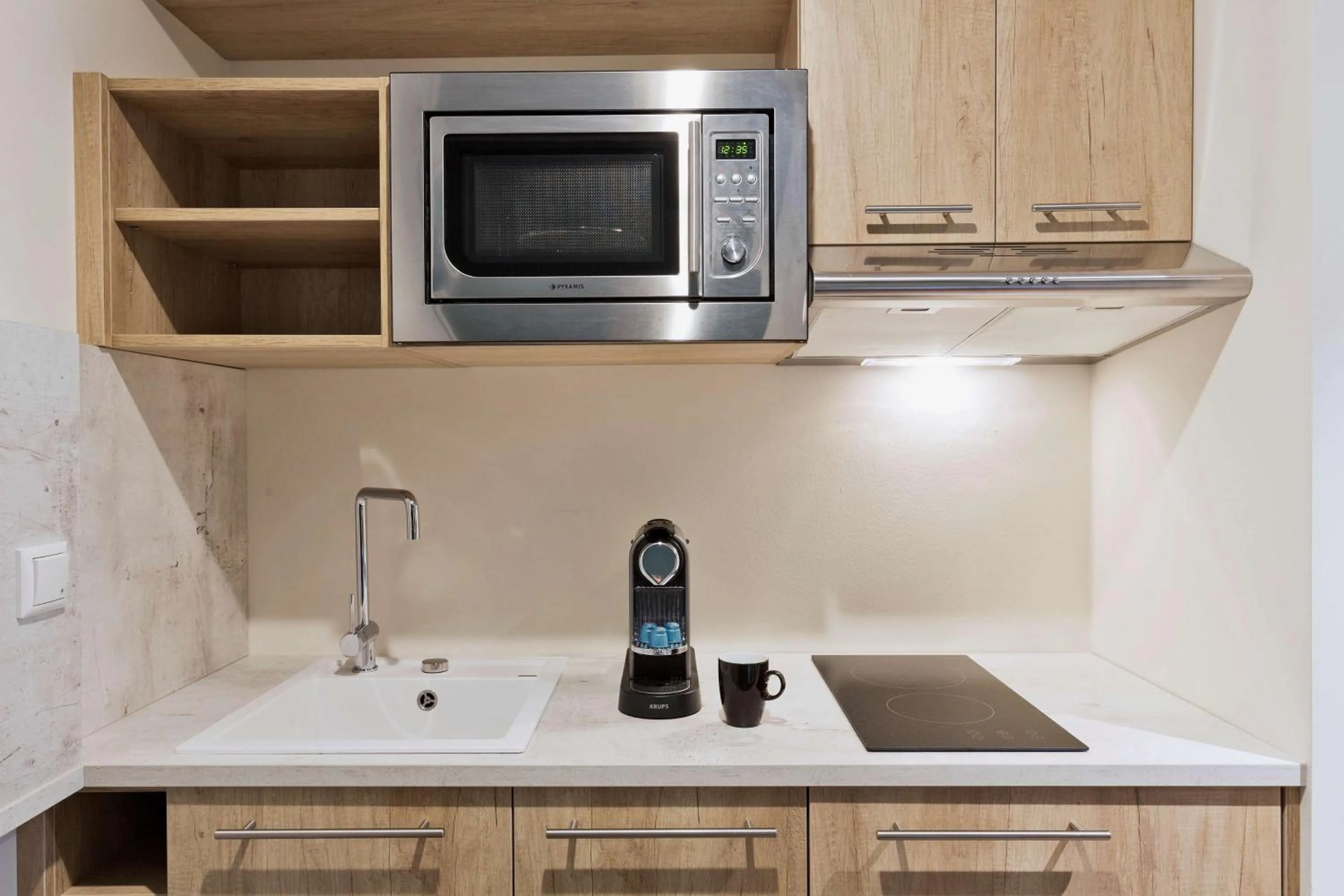 Kitchen or kitchenette in Stellaris Apartment Hotel