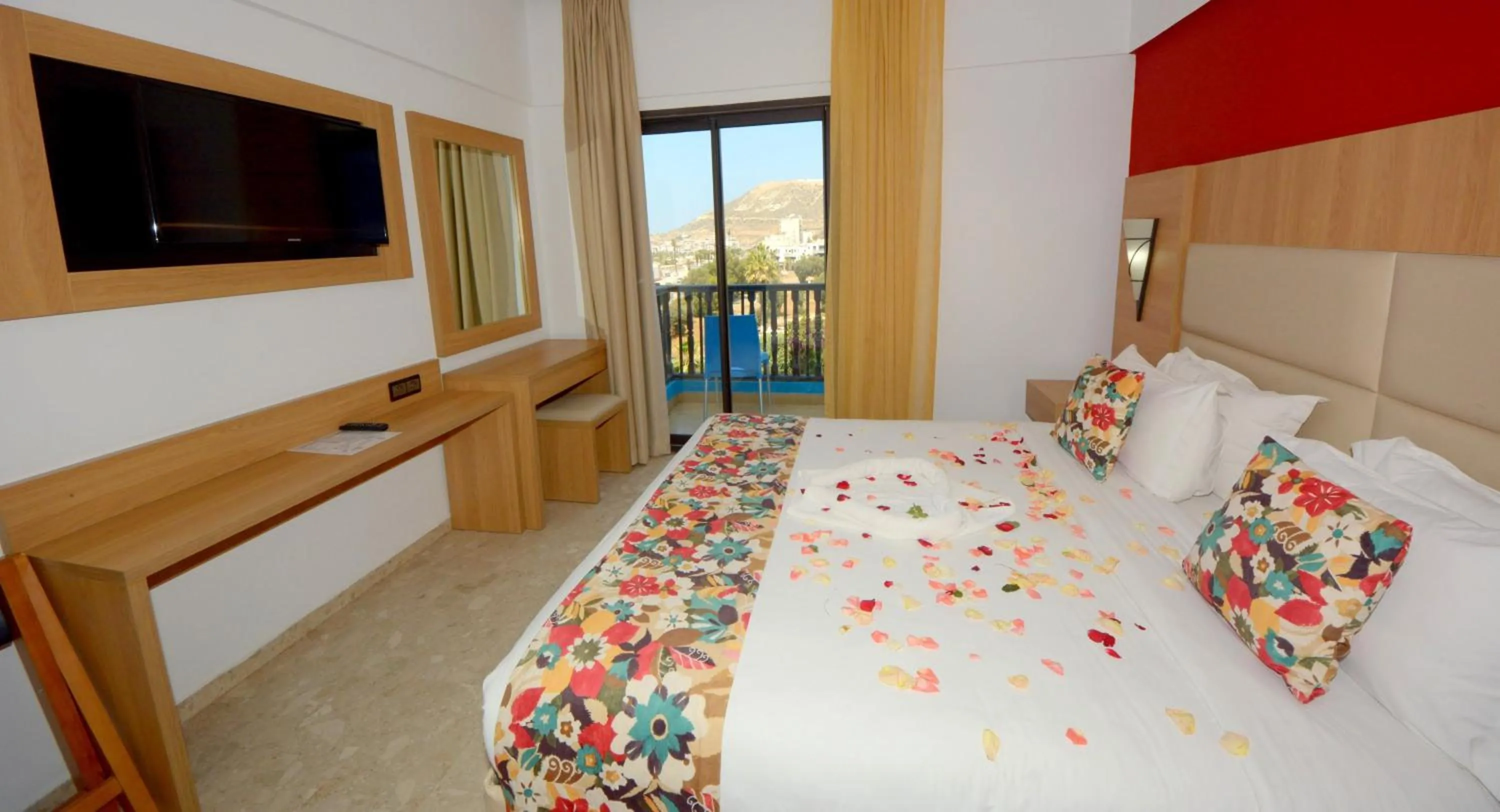 Bed in Oasis Hotel & Spa