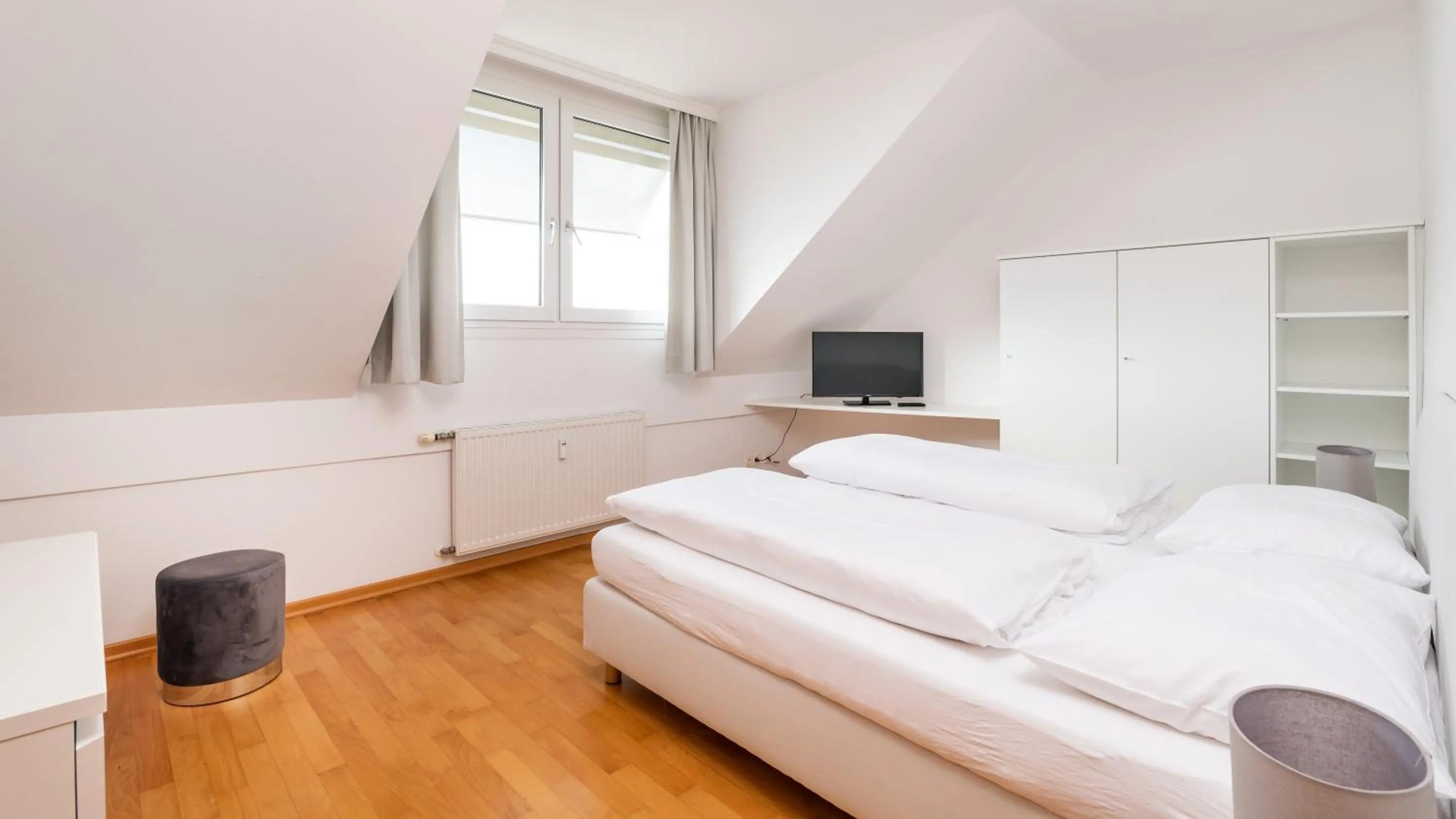 Bed in Werzer Strandcasino Hotel