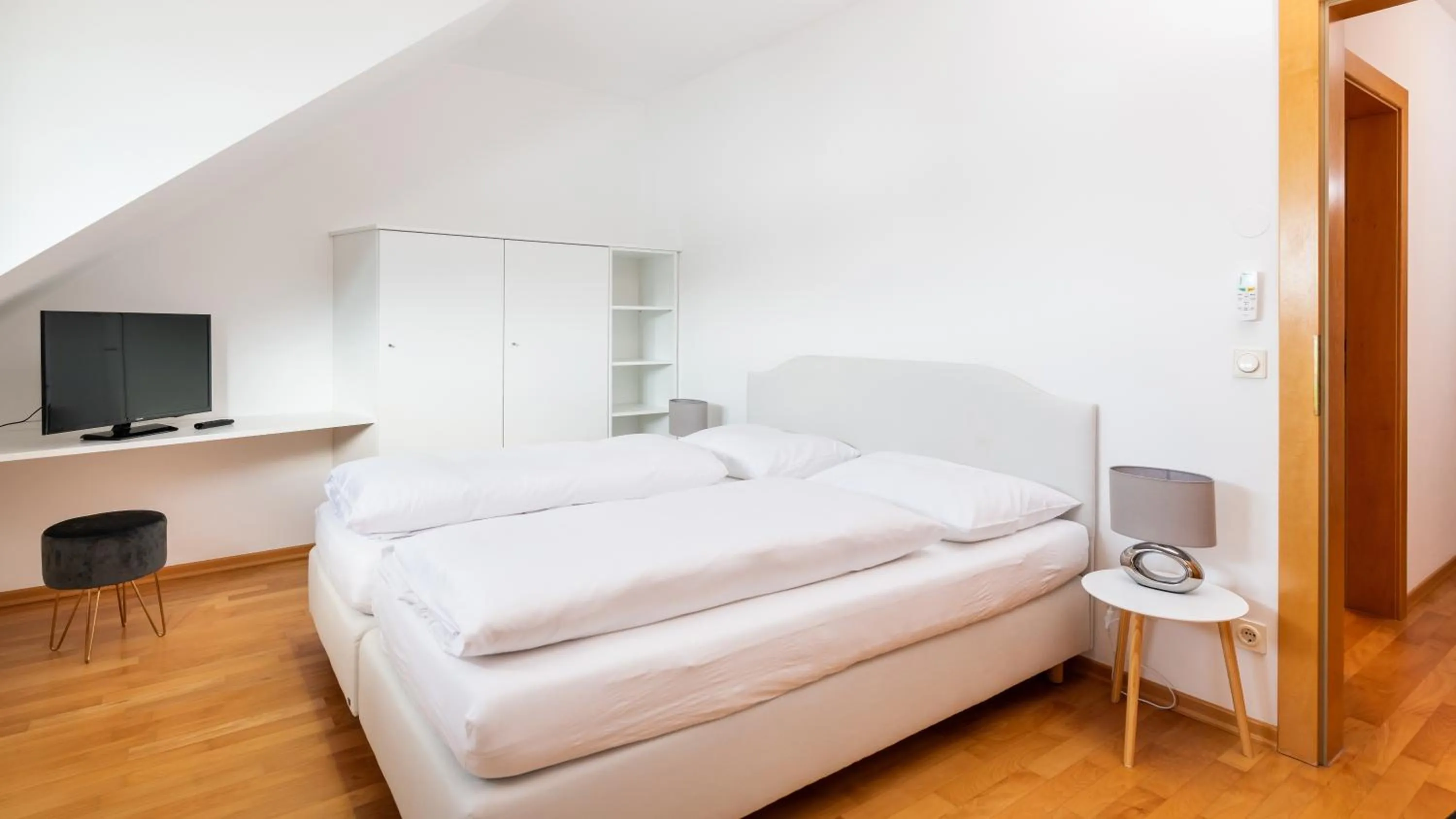 Bed in Werzer Strandcasino Hotel