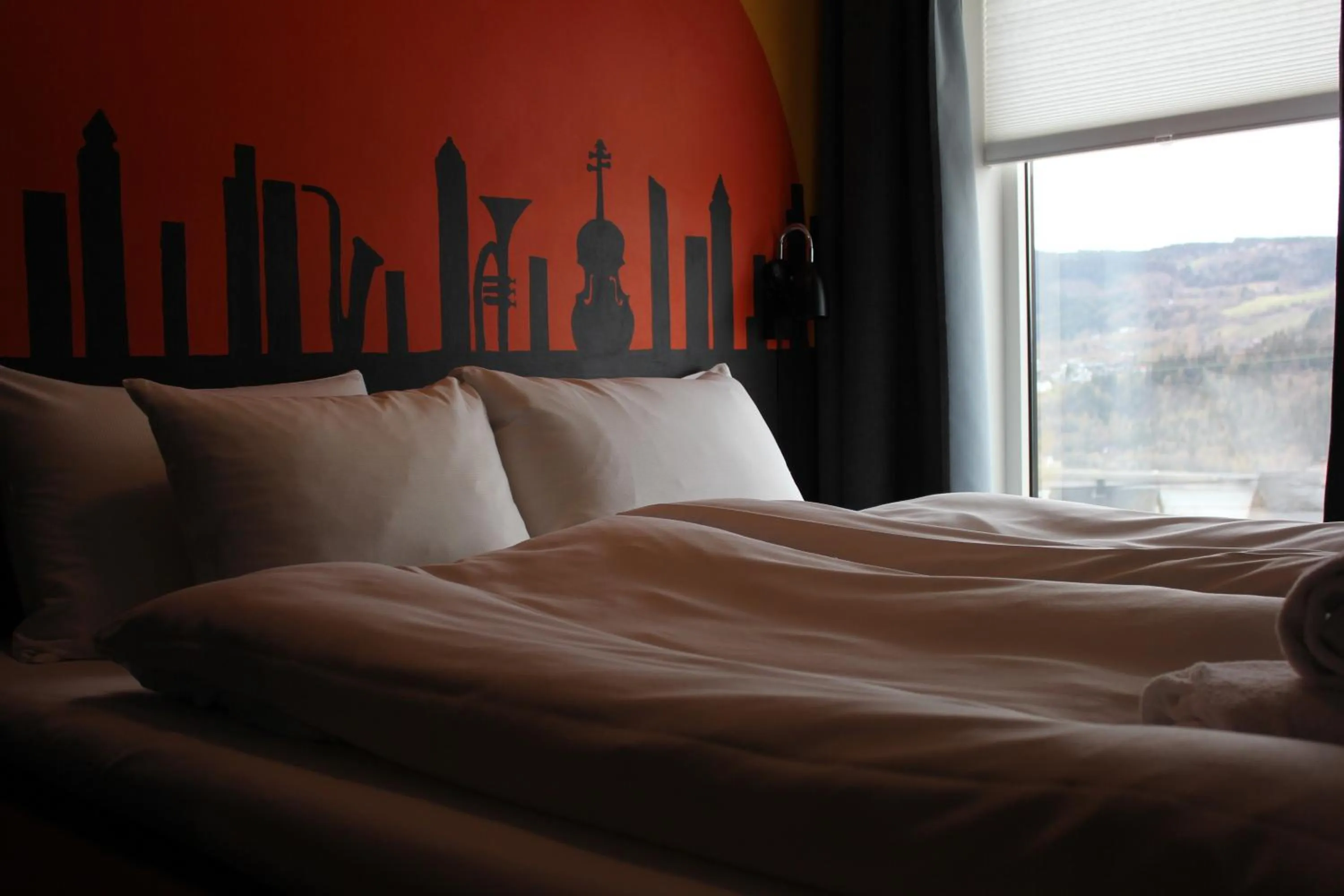 Bed in Stasjonen Hotel