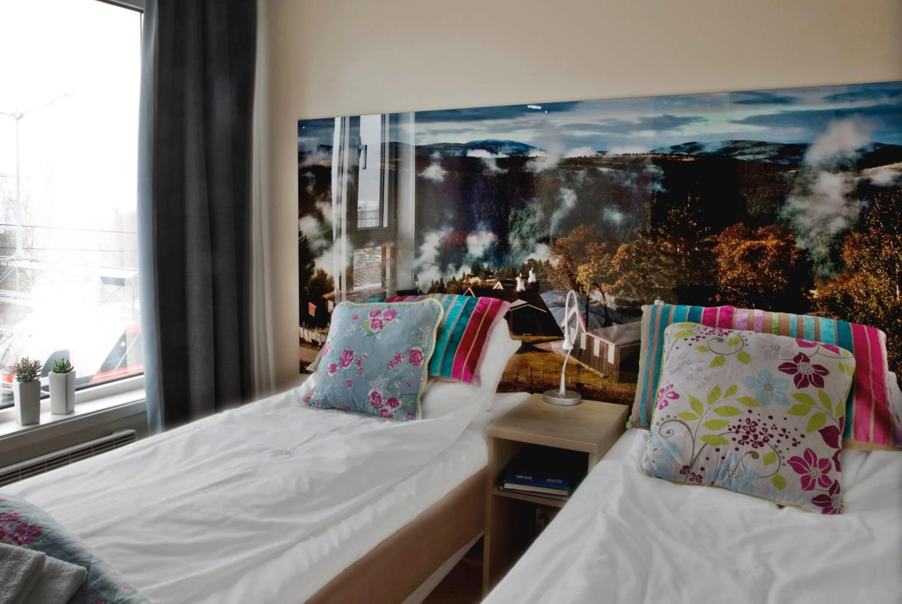 Bed in Stasjonen Hotel