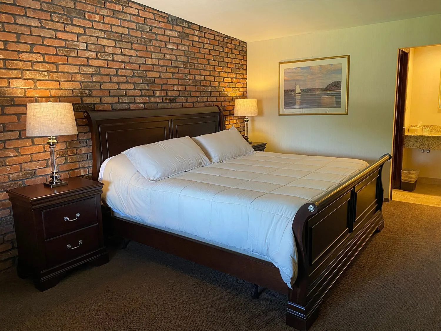 Bed in Chalet Inn & Suites