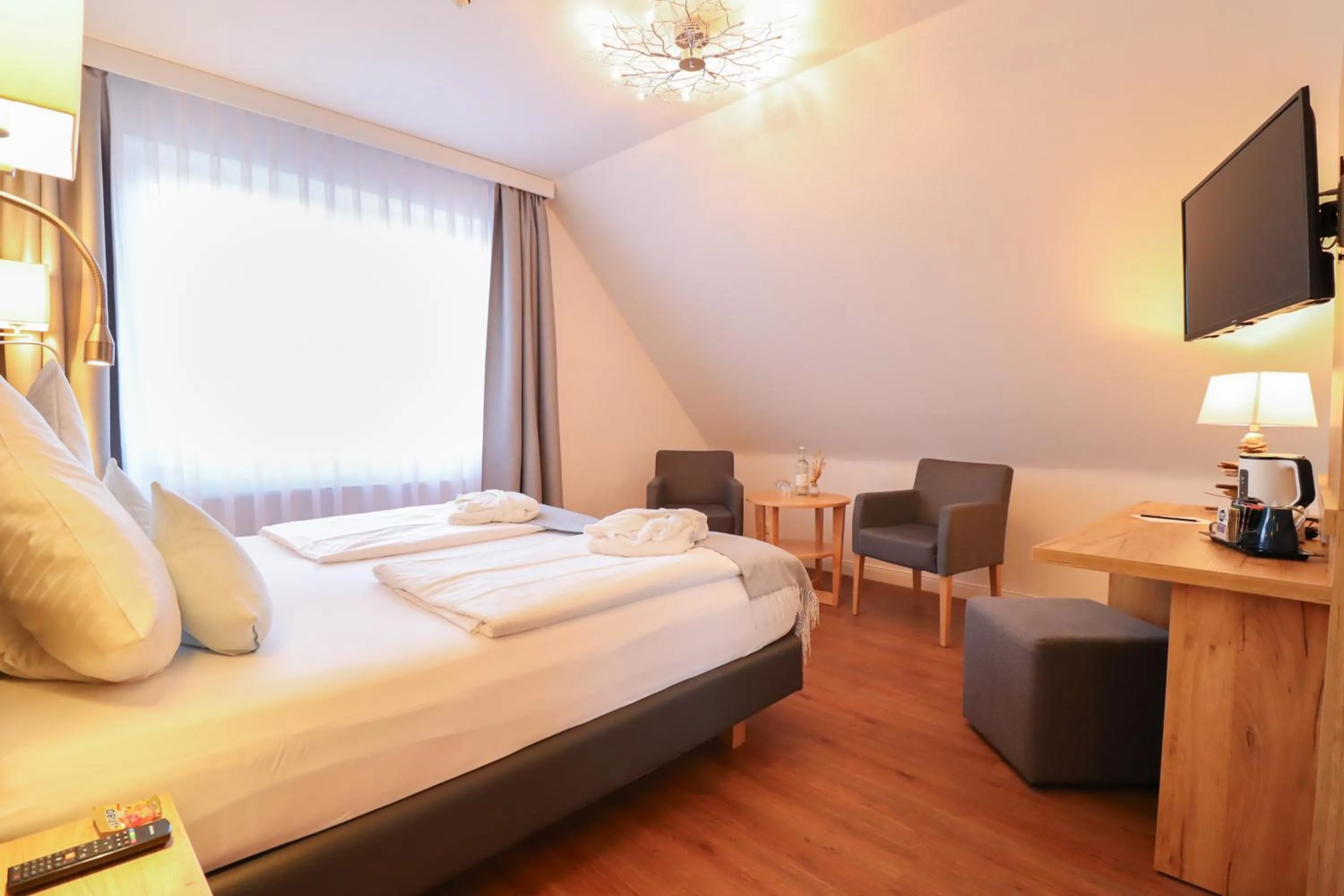 Photo of the whole room, Bed in Hotel Das kleine Glück - Adults Only