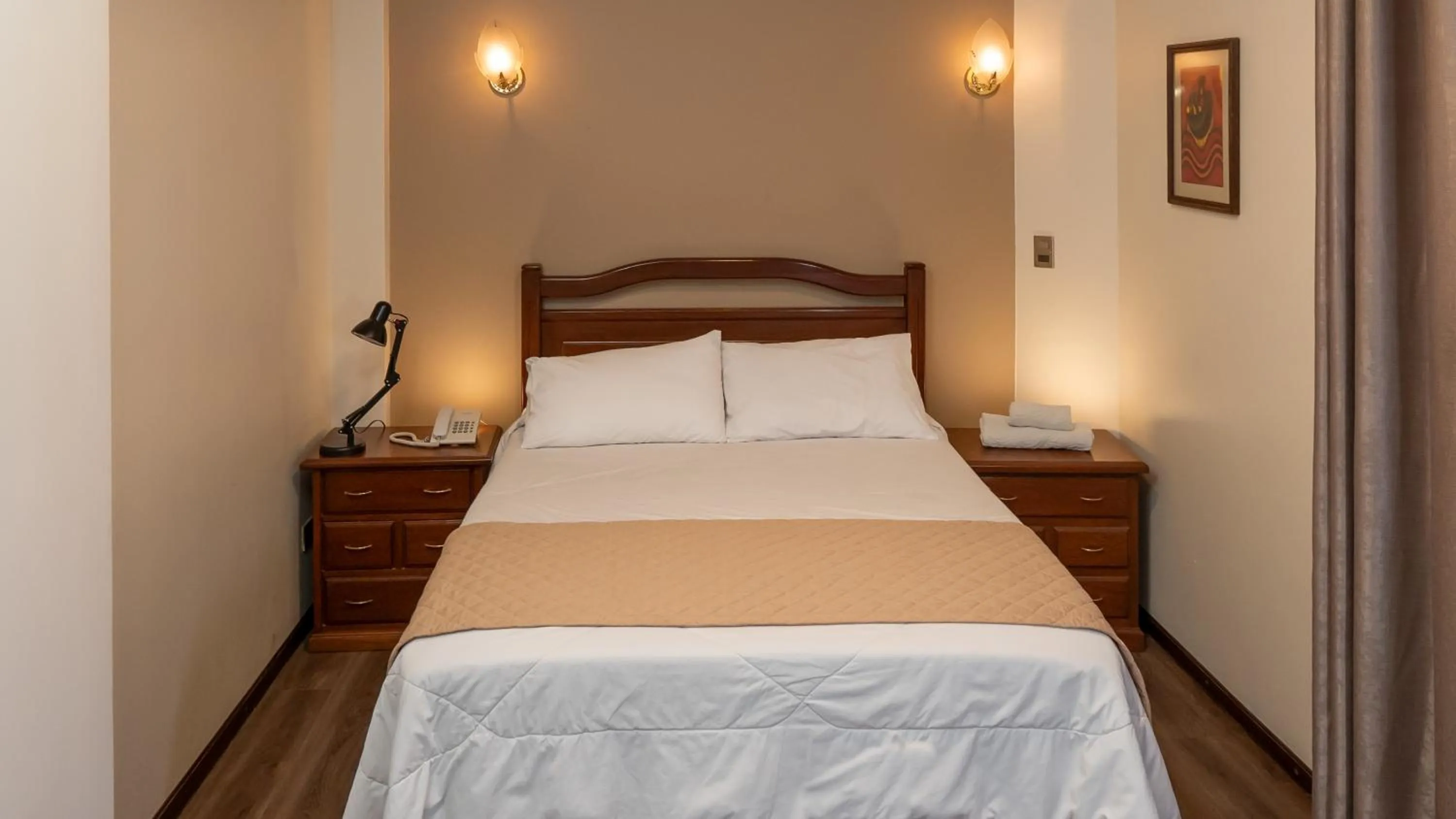 Bed in El Prado Hotel