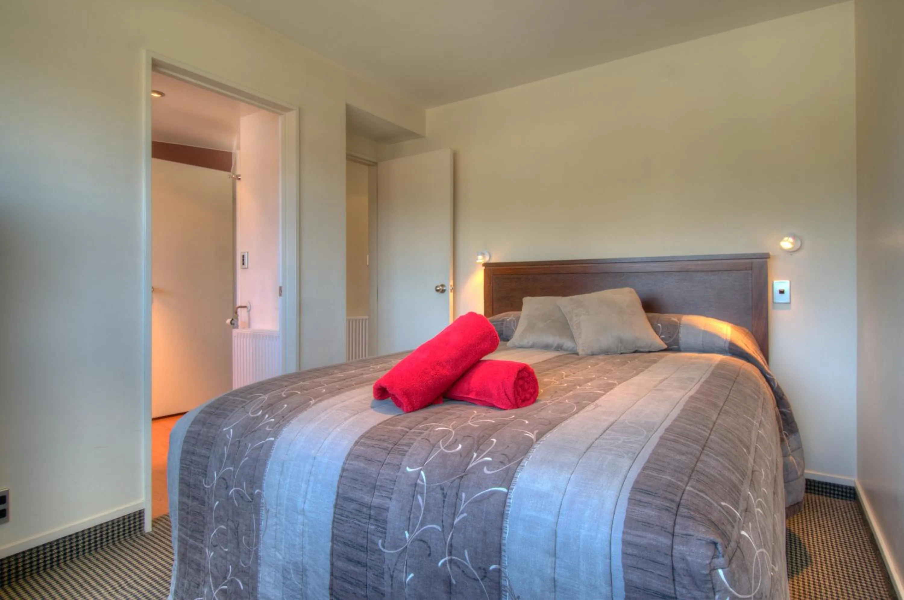 Bed in Four Seasons Motel