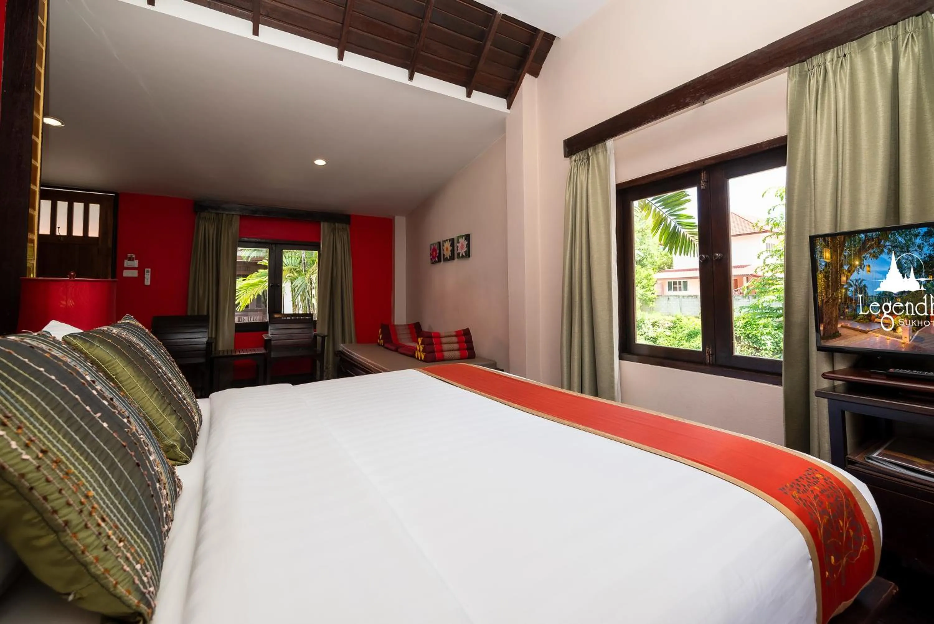 Bed in Legendha Sukhothai Hotel