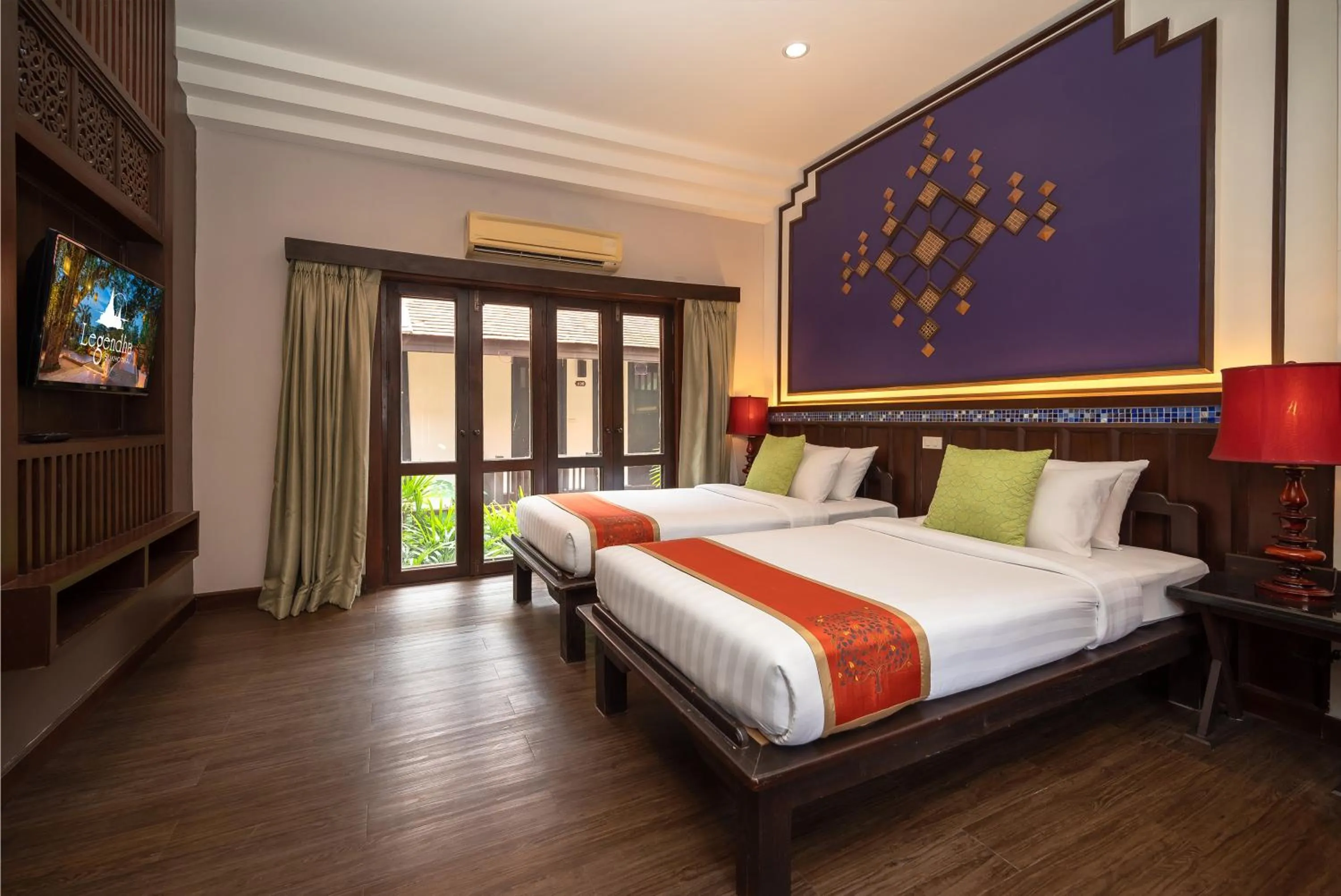 Bed in Legendha Sukhothai Hotel