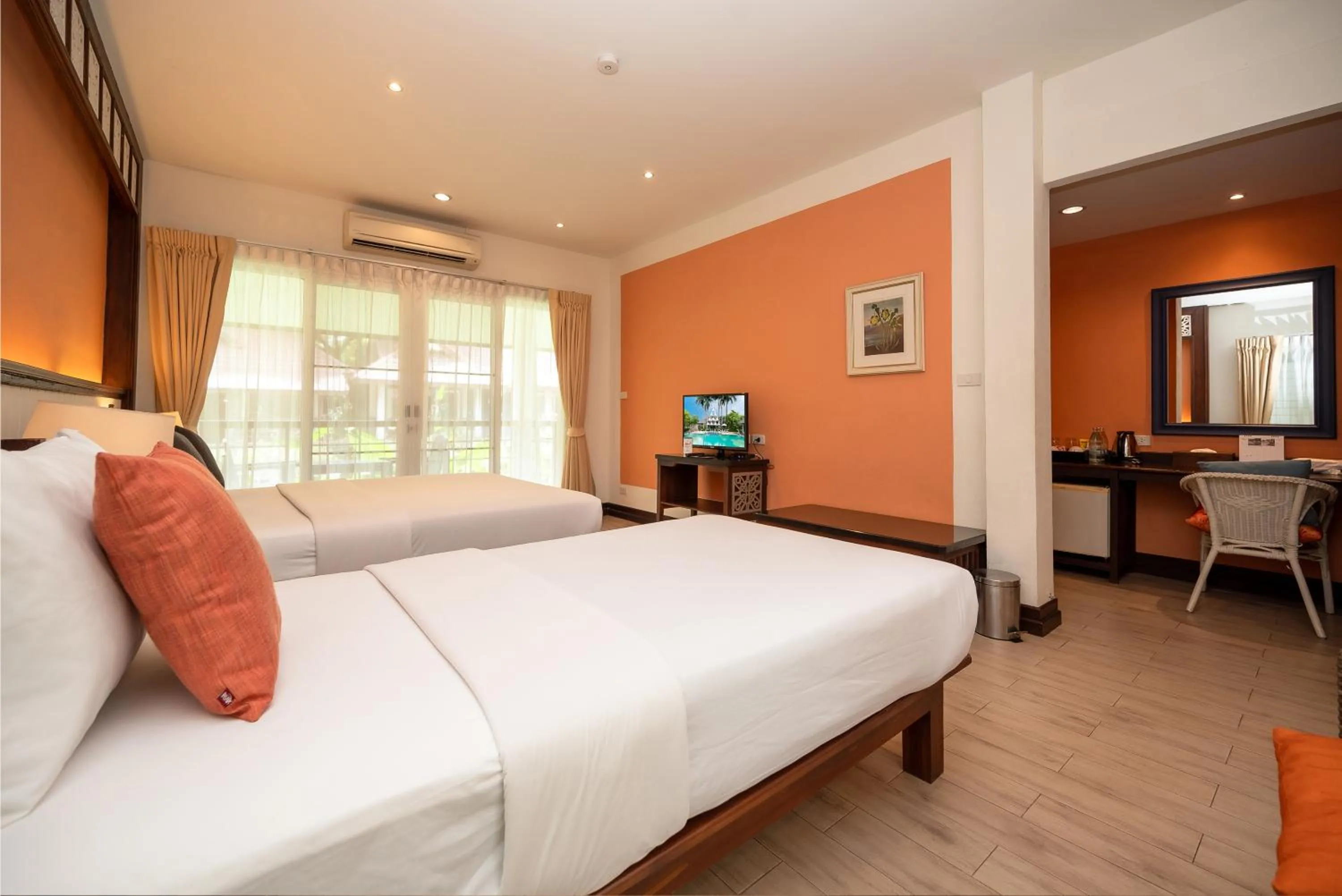 Bed in Le Charme Sukhothai Historical Park