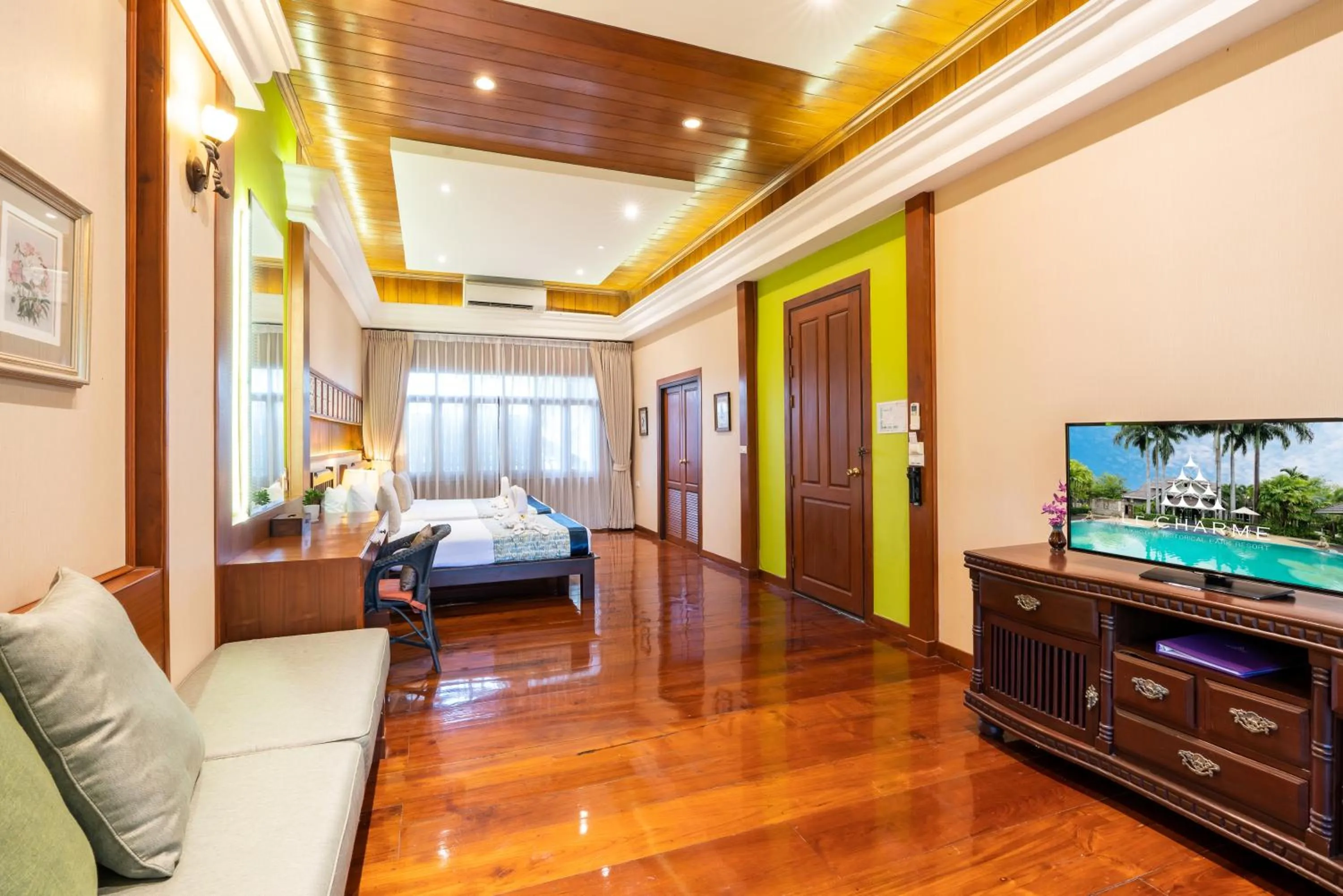 Bed in Le Charme Sukhothai Historical Park