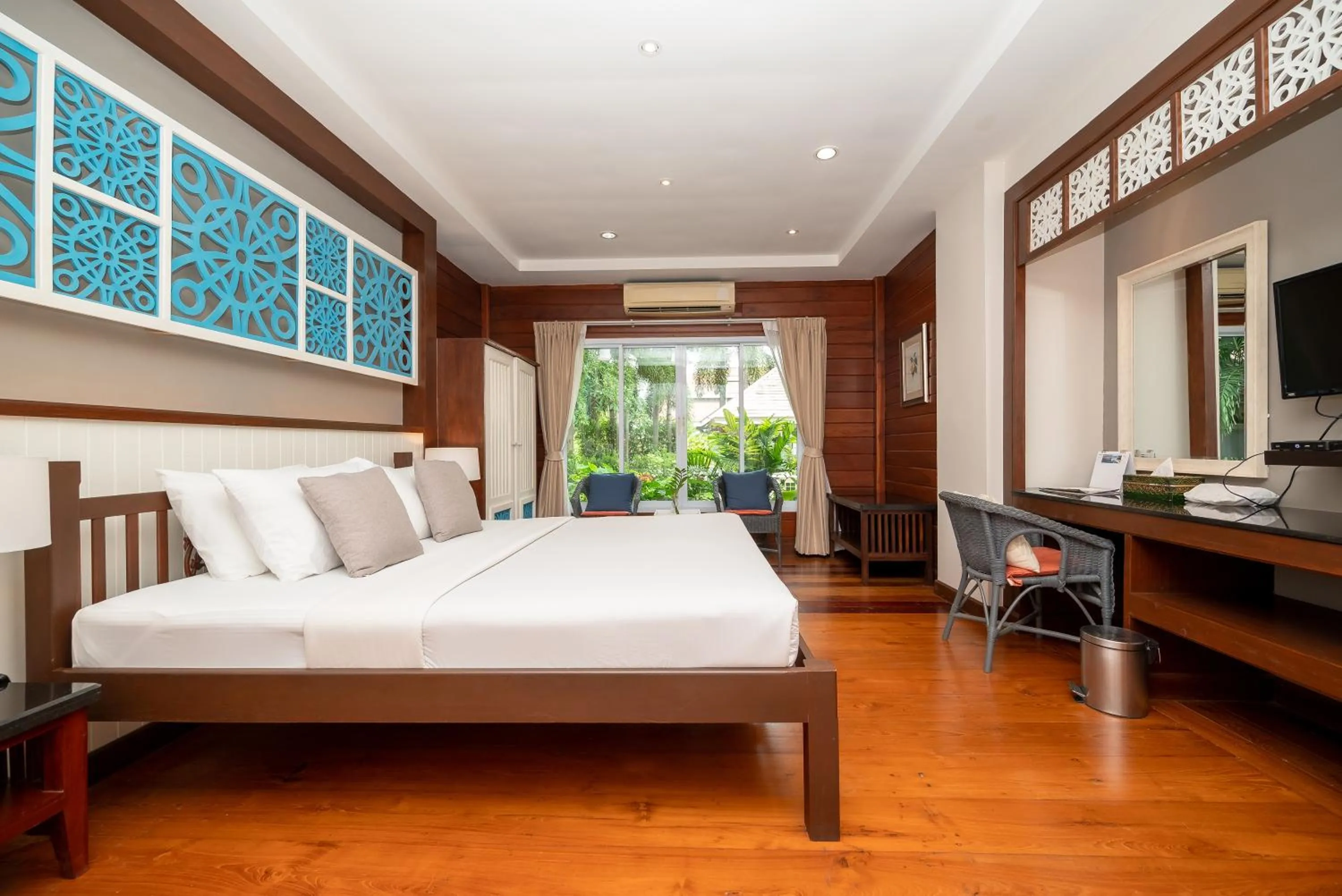 Bed in Le Charme Sukhothai Historical Park