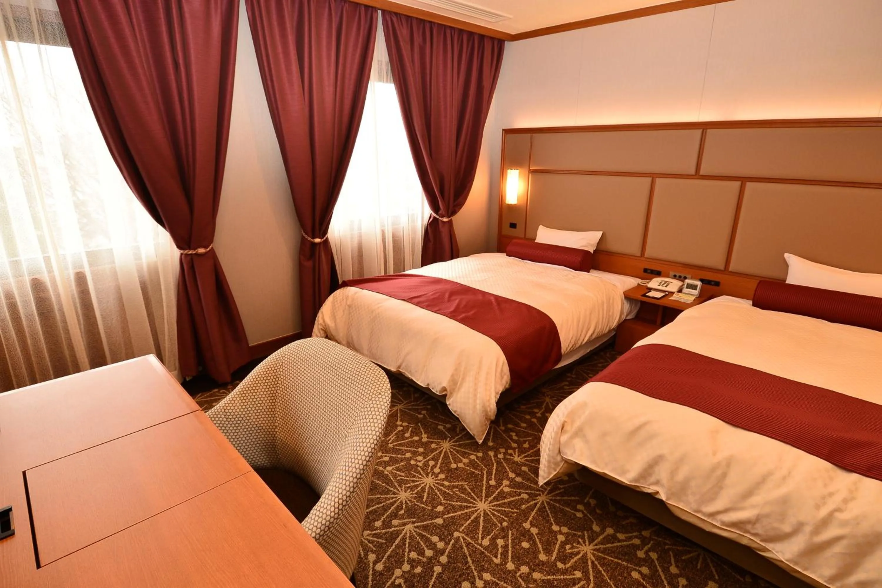 Bed in Hotel Sunroute Sano