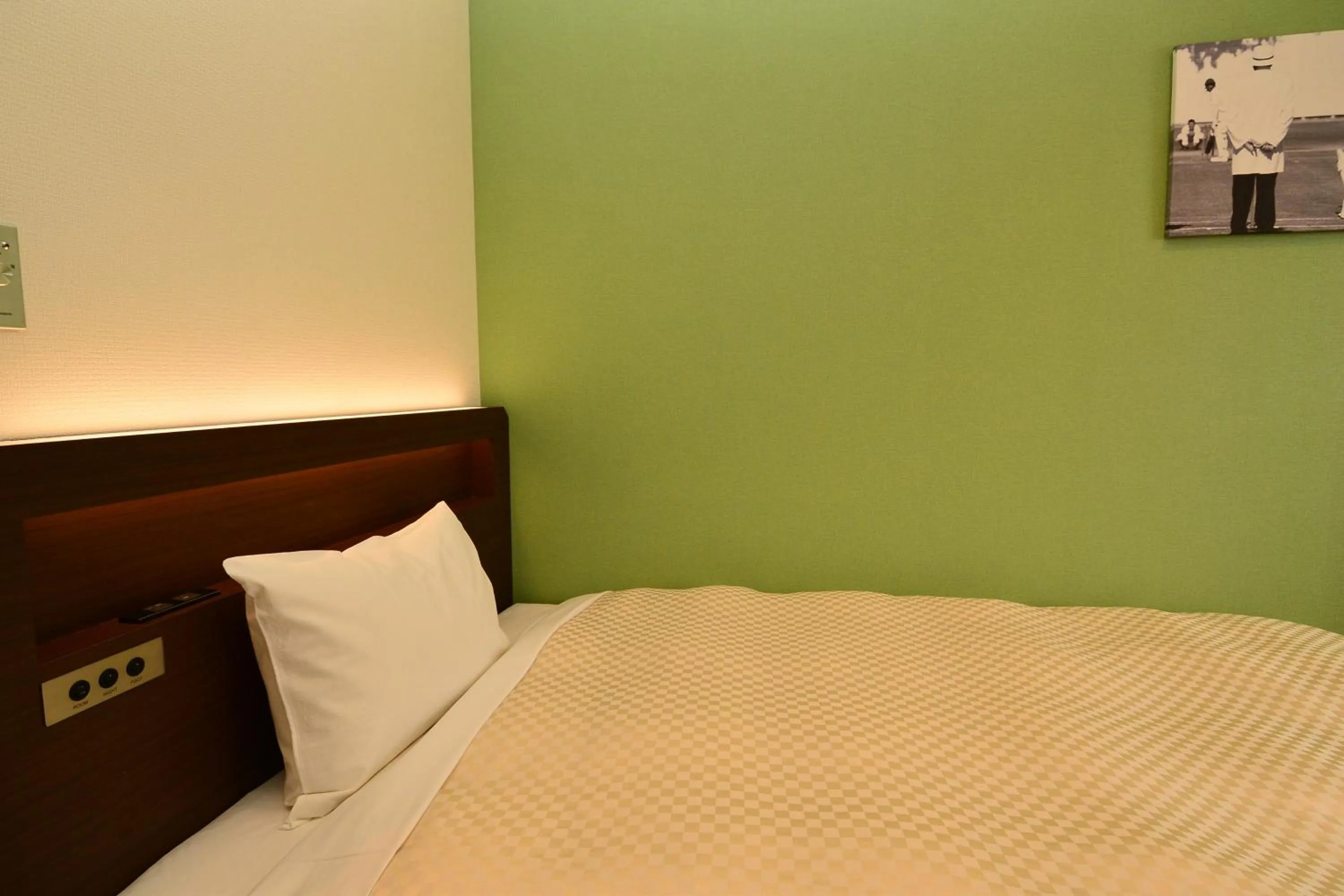 Bed in Hotel Sunroute Sano