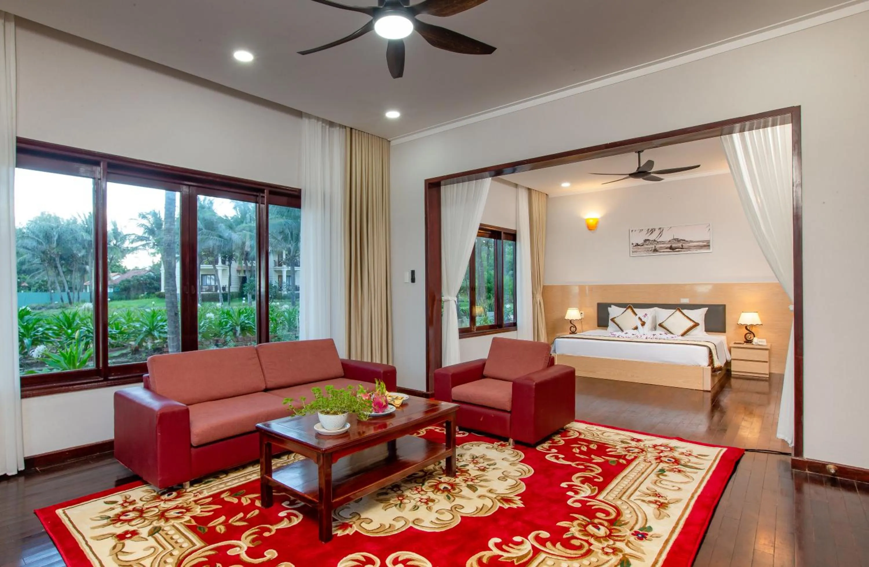 Living room, Bed in Golden Coast Resort & Spa